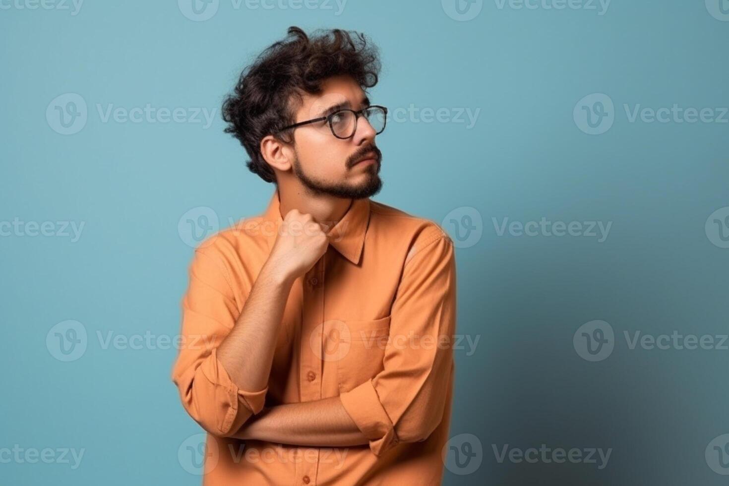 a Young man thinking an idea while looking up photo