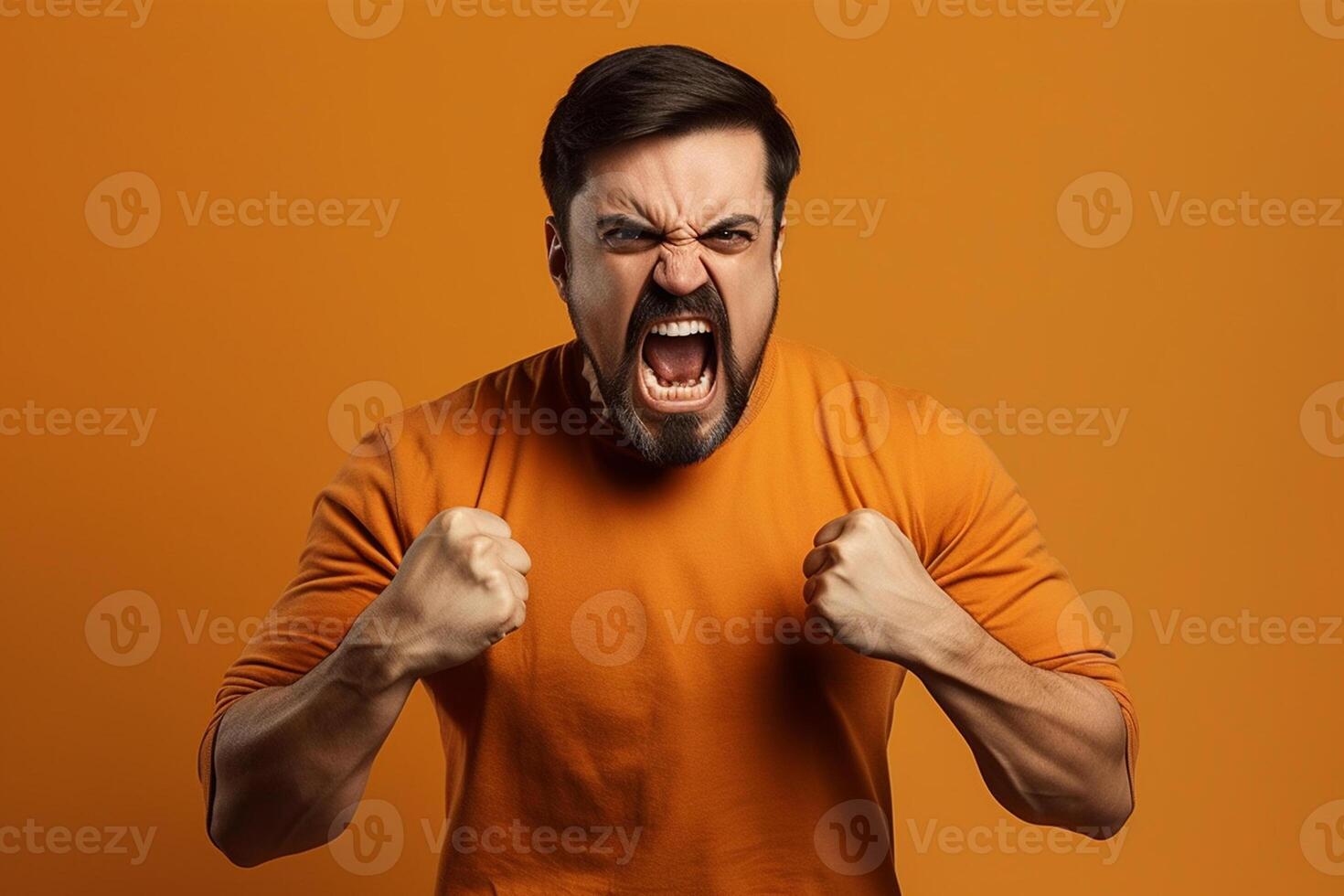 a man on solid color background photoshoot with Anger face experession photo