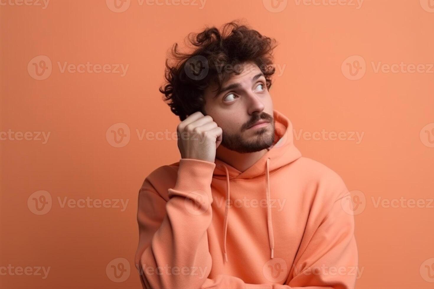 Photo of a confused young man posing