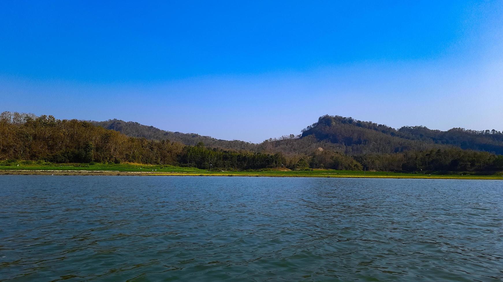 A view of the lake from the boat. photo