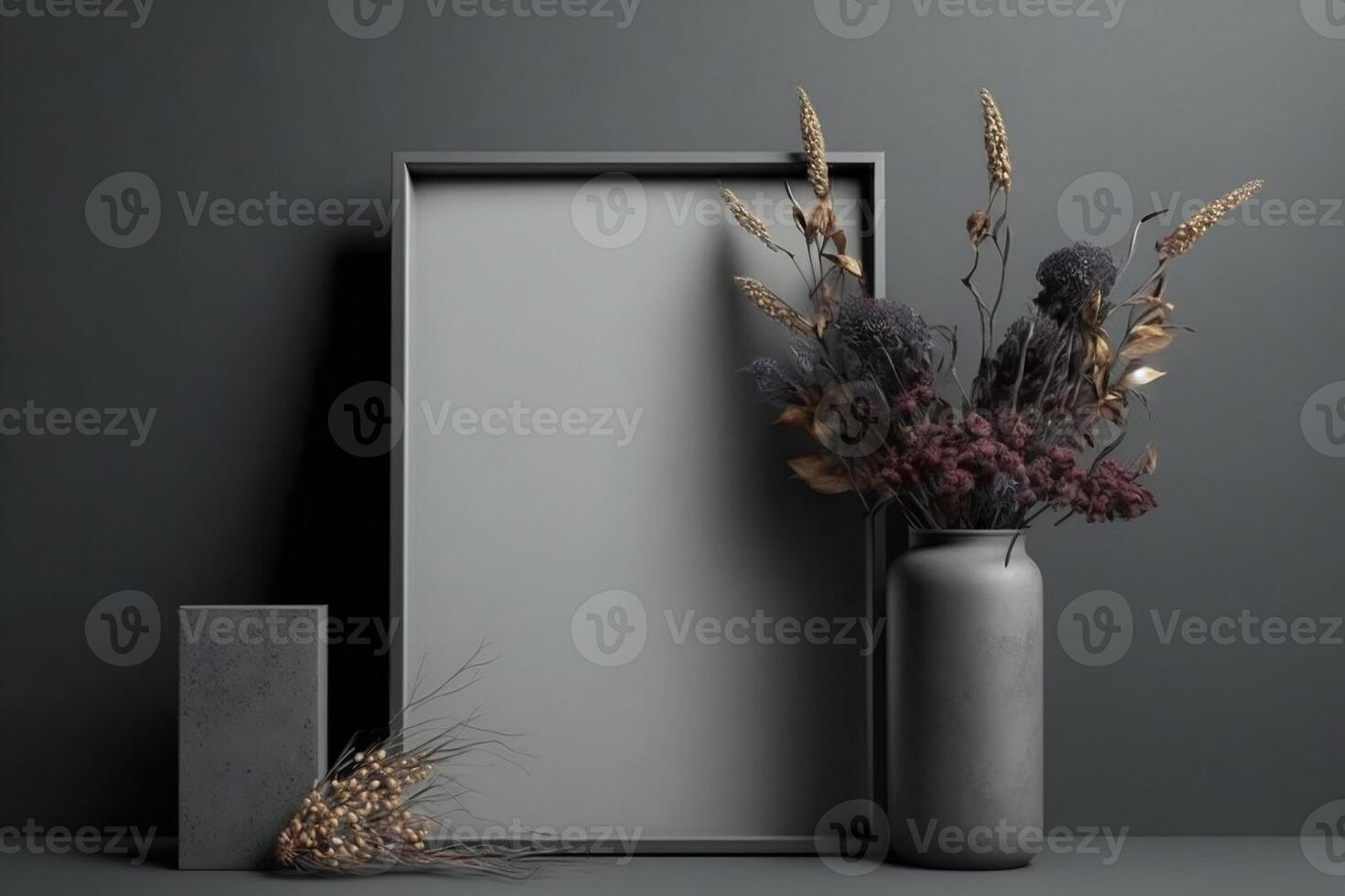 Black thin vertical frame mock up beside concrete vase with dry flowers over gray wall. photo