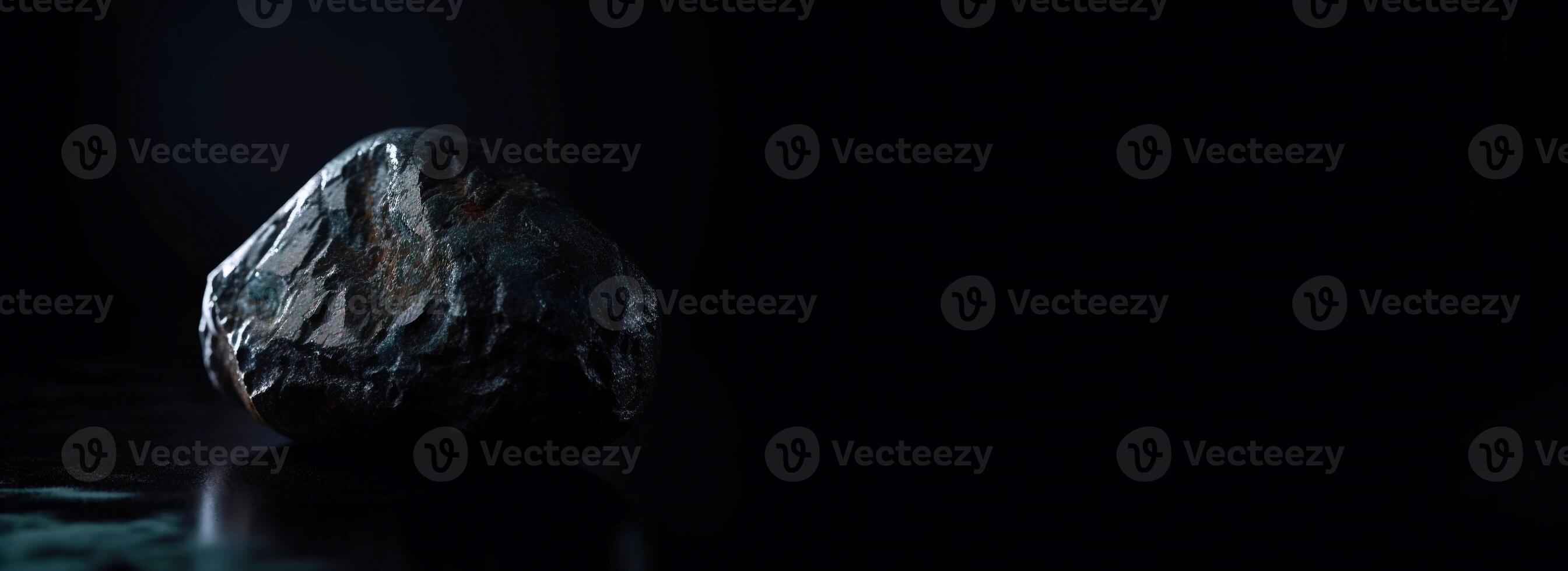 Pudretite is a rare precious natural stone on a black background. . Header banner mockup with space. photo