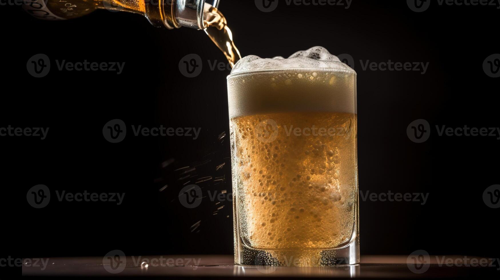 A glass of beer with splashes. photo