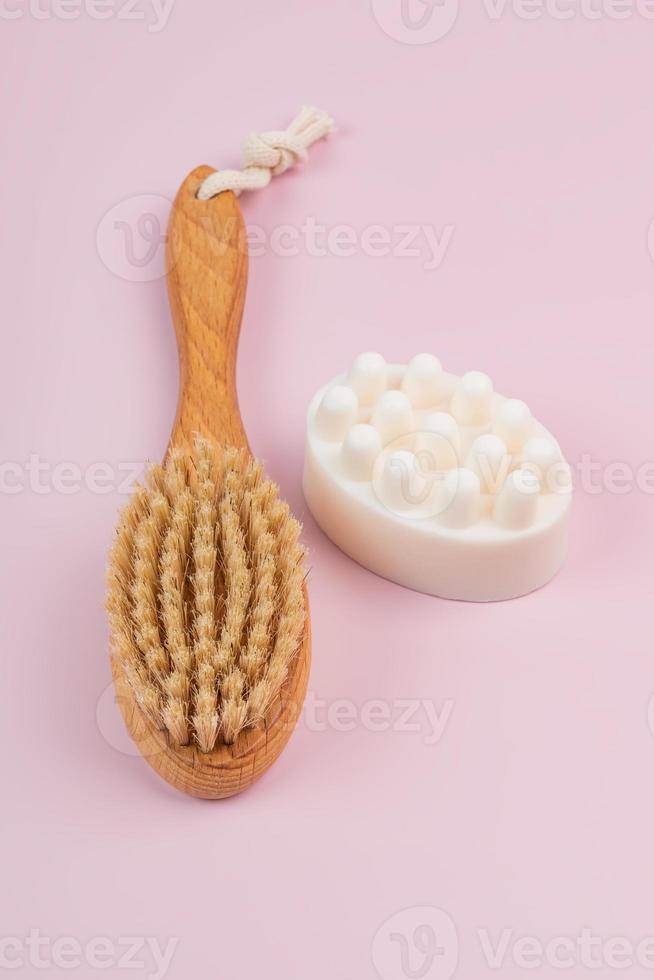 Dry massage brush with natural bristle and vanila and honey massaging soap bar for SPA procedures at home. Skin care photo