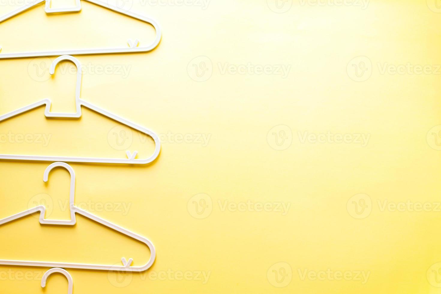 Flat lay baby cute clothes hangers photo
