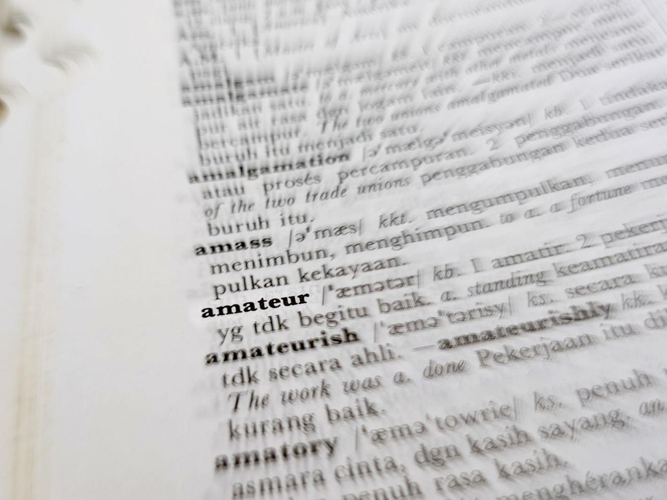 a close up of the word amateur in the English to Indonesian dictionary. For word background or wallpaper photo