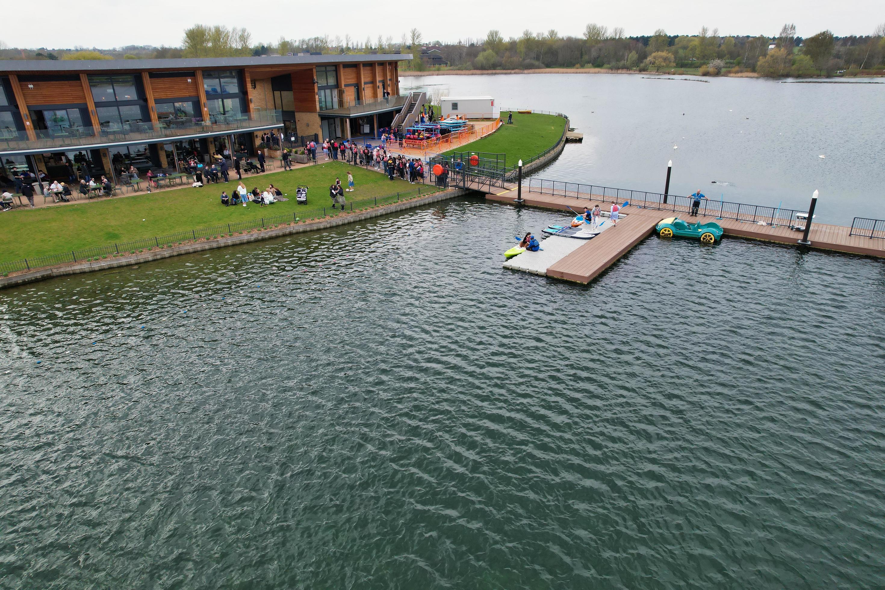beautiful View of Willen Lake Park with Local and Tourist Public Enjoying the Beauty of Lake and