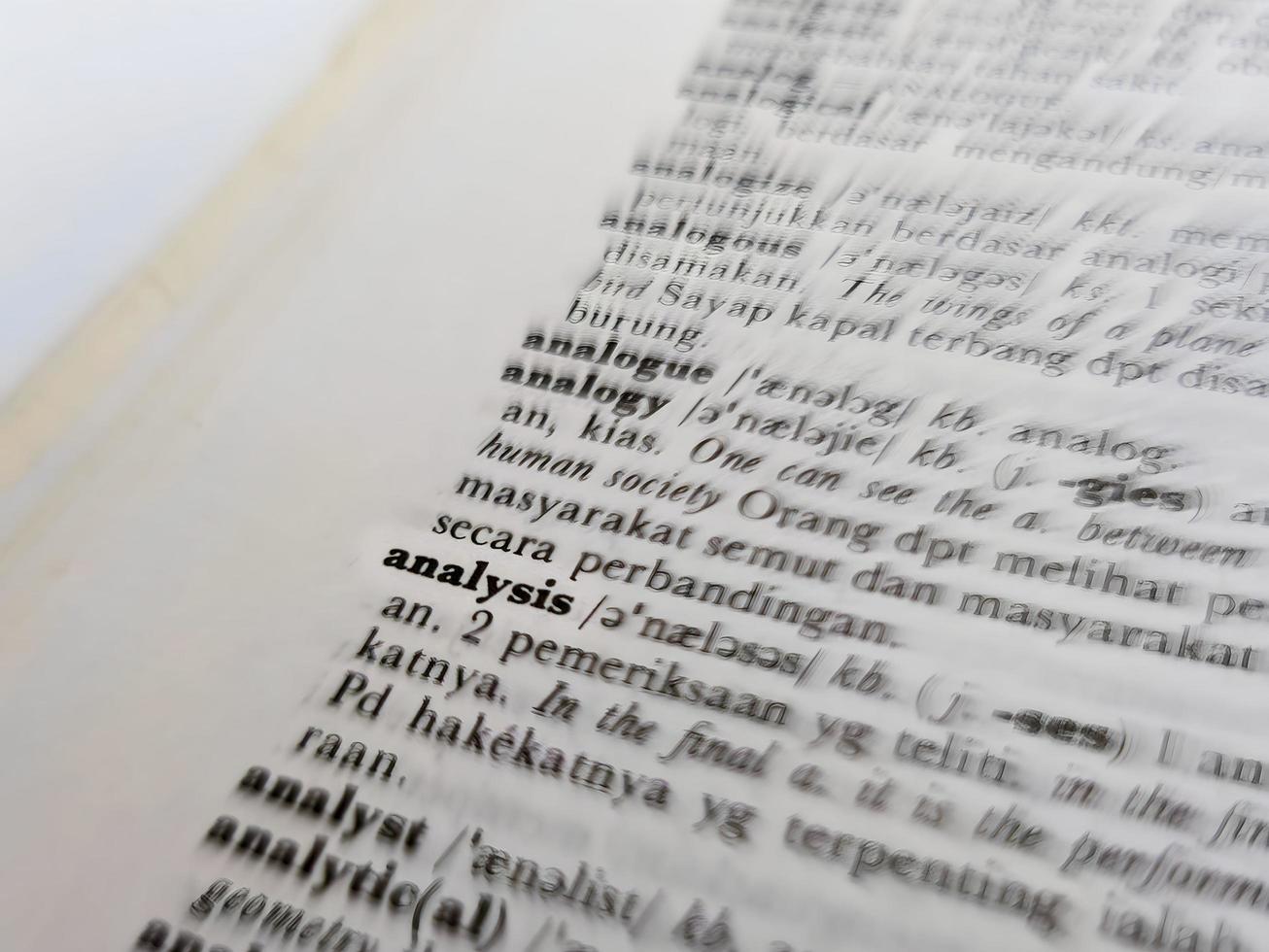a close up of the word analysis in the English to Indonesian dictionary. For word background or wallpaper photo