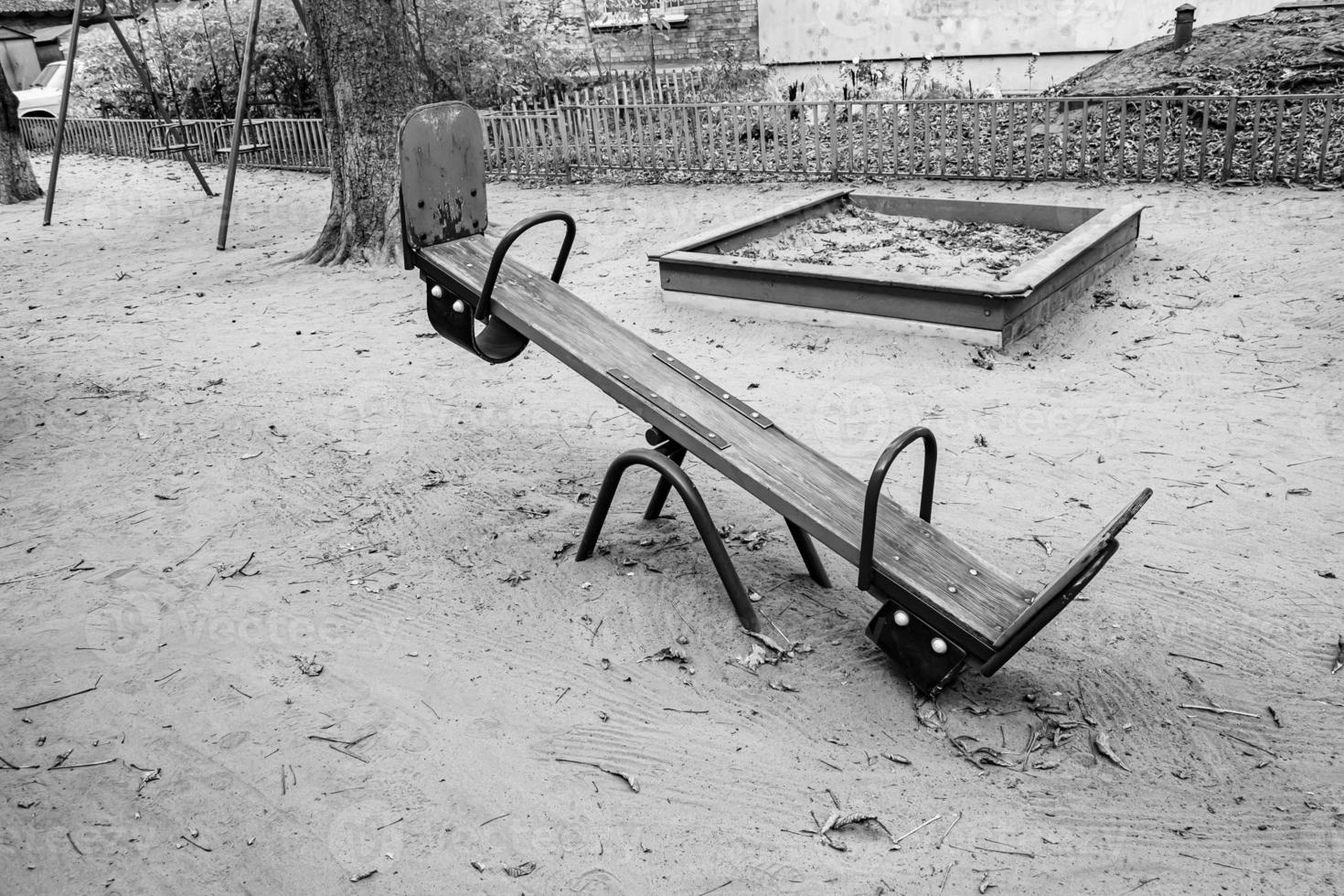 Photography on theme empty playground with metal swing for kids photo