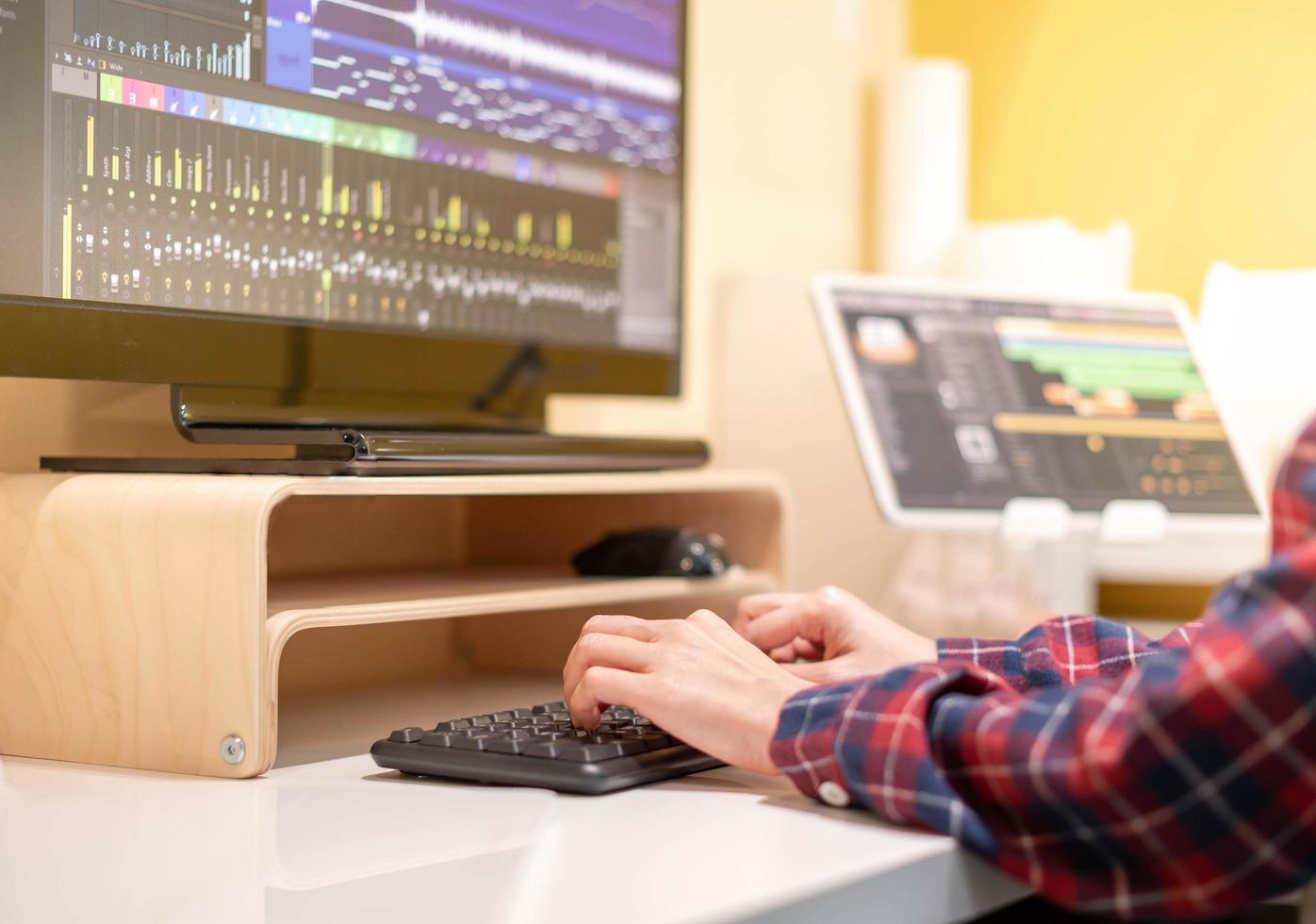 The woman investor trading or stock brokers having a planning and analyzing with display screen and pointing on the data presented and deal on a stock exchange. photo