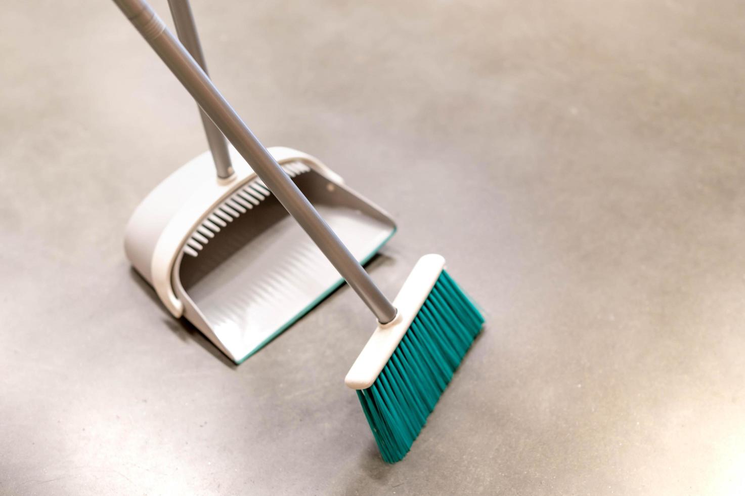 Mop and equipment for cleaning dirty wood floor, household mopping, cleaning background. photo