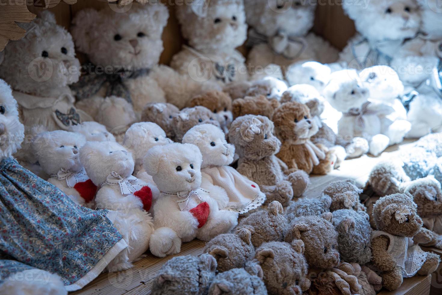 original soft delicate plush vintage toys displayed on shelves photo