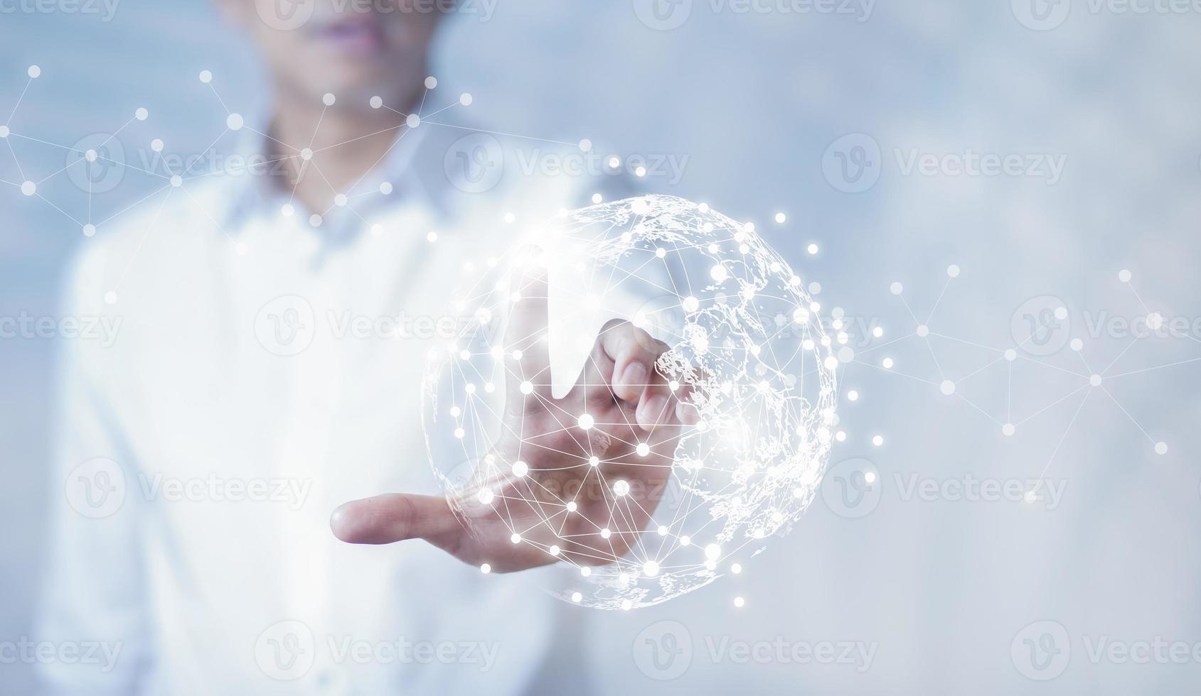 Businessman holding connections system and global data exchange. ,Business network connection concept. hologram screen displaying modern web system Wireless connection futuristic concept photo