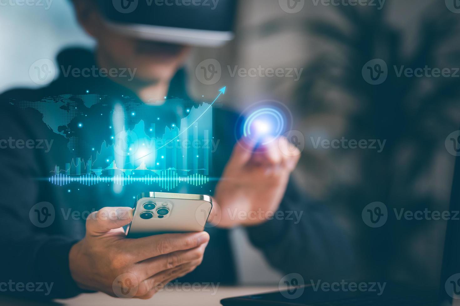 Man wearing VR glasses virtual hold smartphone Investment finance chart stock market business and financial growth graph. Business strategy development and growing growth plan,growth graph of business photo