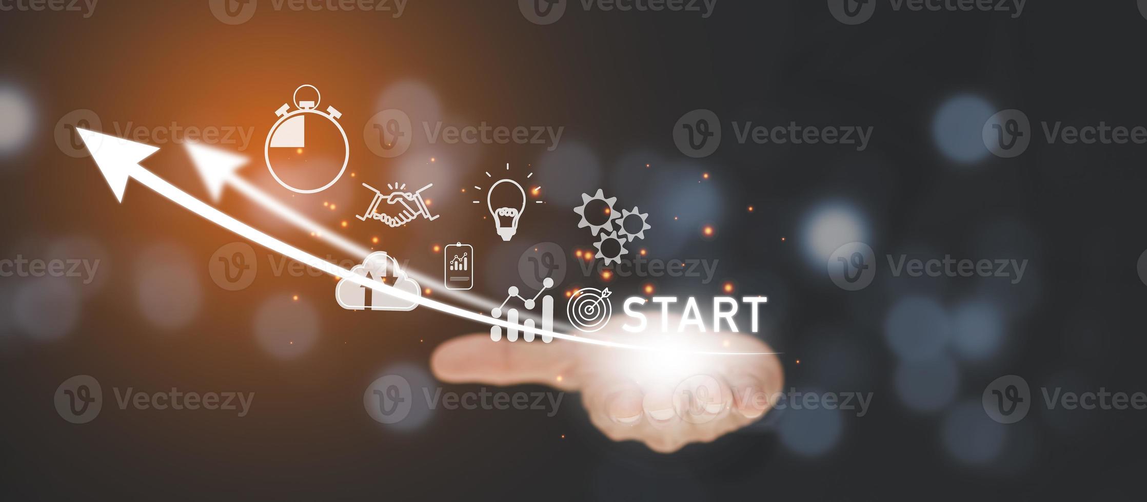 Startup concept with icon business and network connection on modern virtual interface from digital tablet.Businessman Touching tablet and graph Screen Icon of media screen, Technology Process System. photo