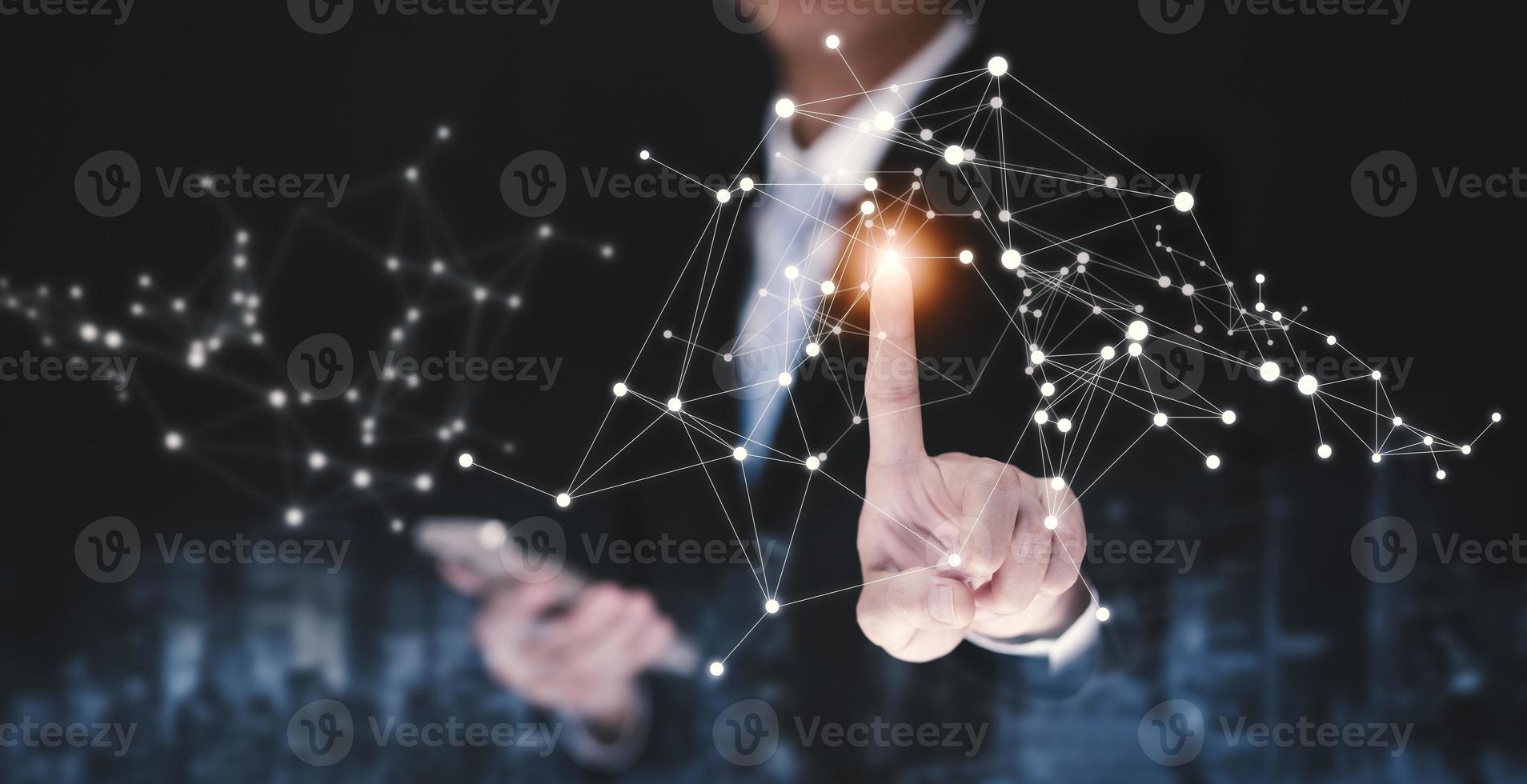 Businessman touch connections system and global data exchange. ,Business network connection concept. hologram screen displaying modern web system Wireless connection futuristic concept photo