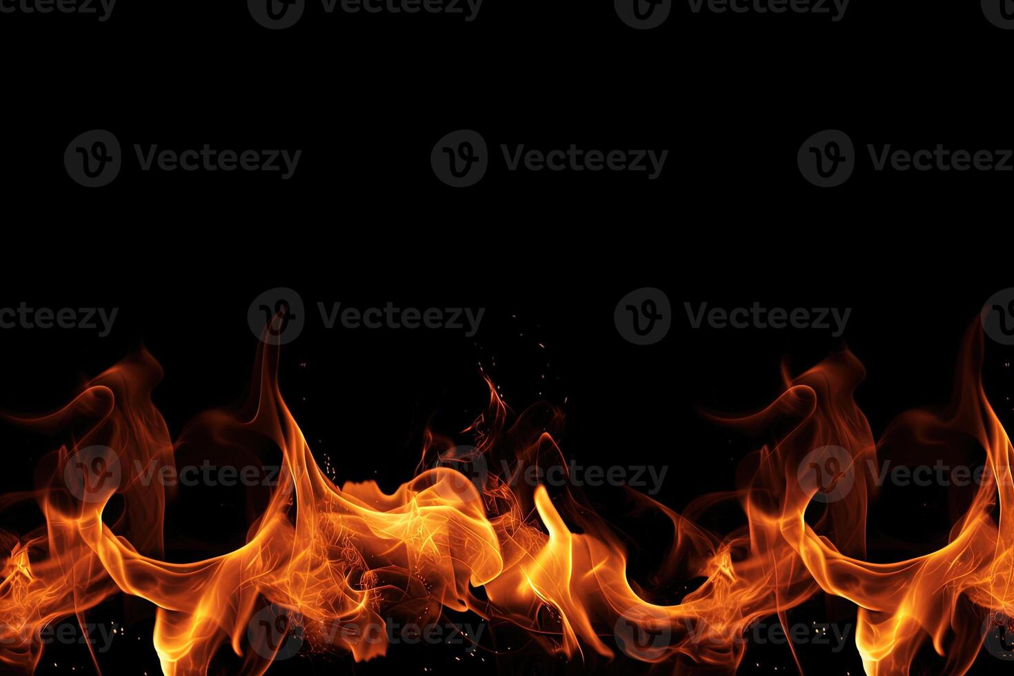 Burning fire flame on black background with copy space. photo