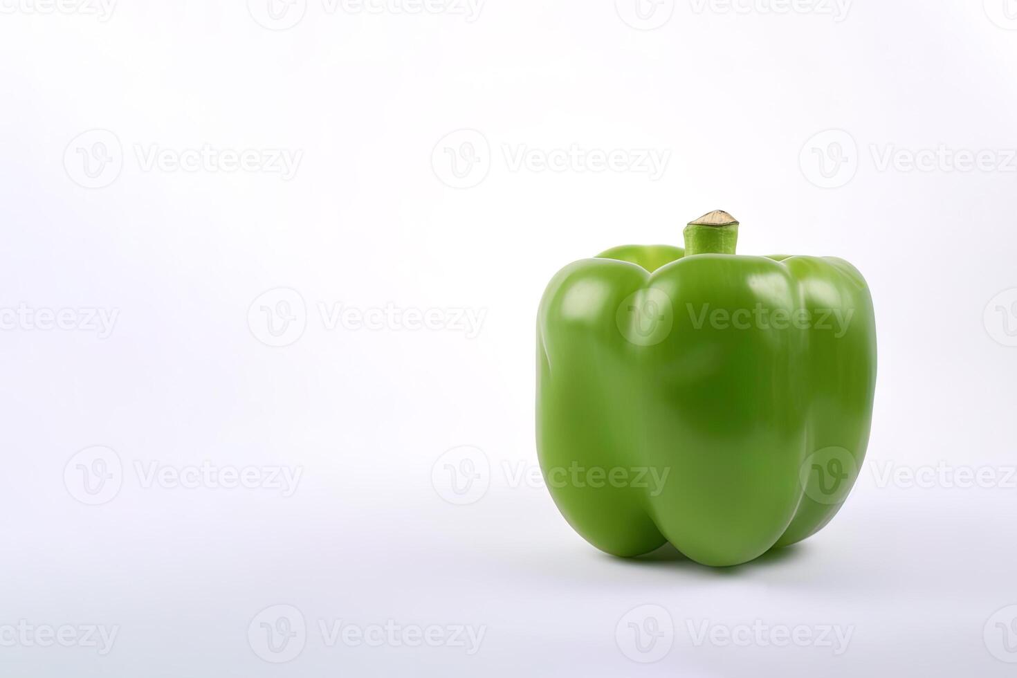 green bell pepper isolated on white background with copy space. photo