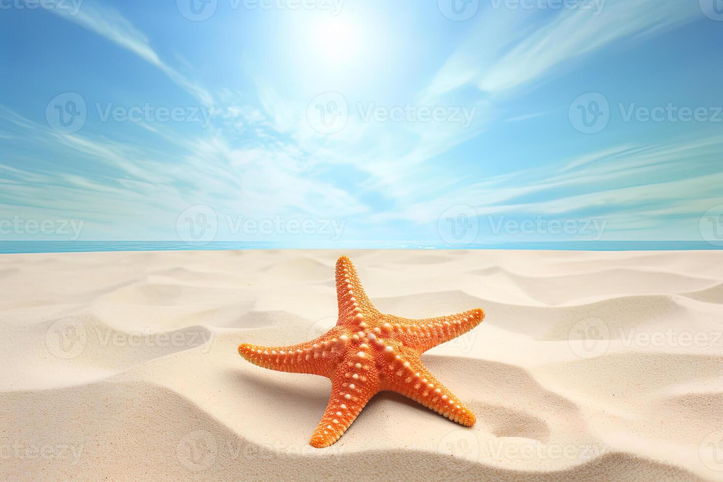 a starfish on a sandy beach with the ocean in the background. photo