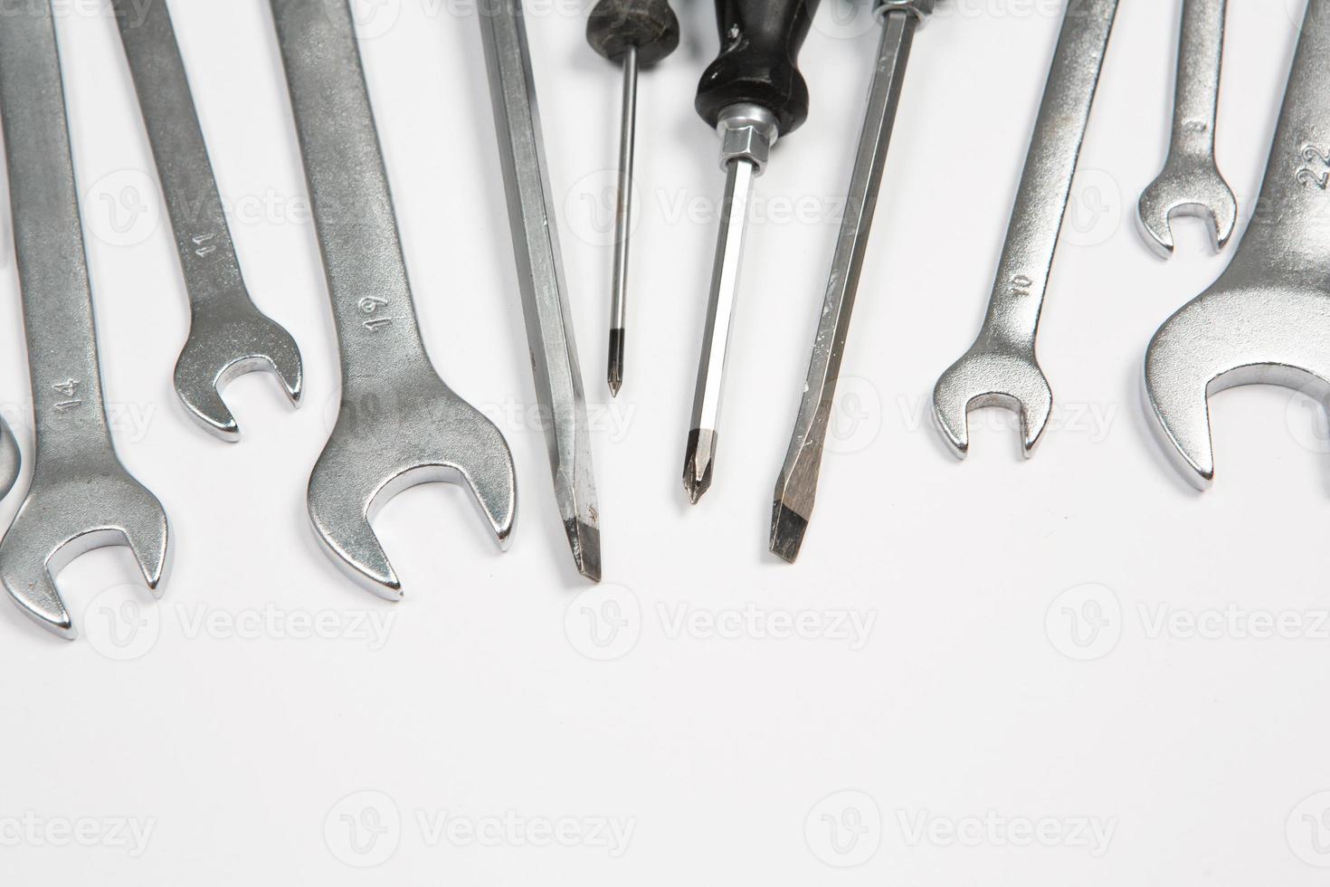 Set of tools for repair in a case on a white background. Assorted work or construction tools. Wrenches, Pliers, screwdriver. Top view photo