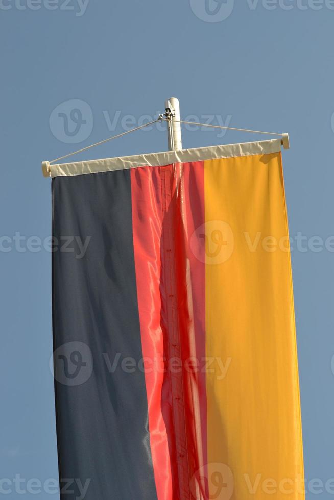 Material Flag of Germany and Sky in Background photo