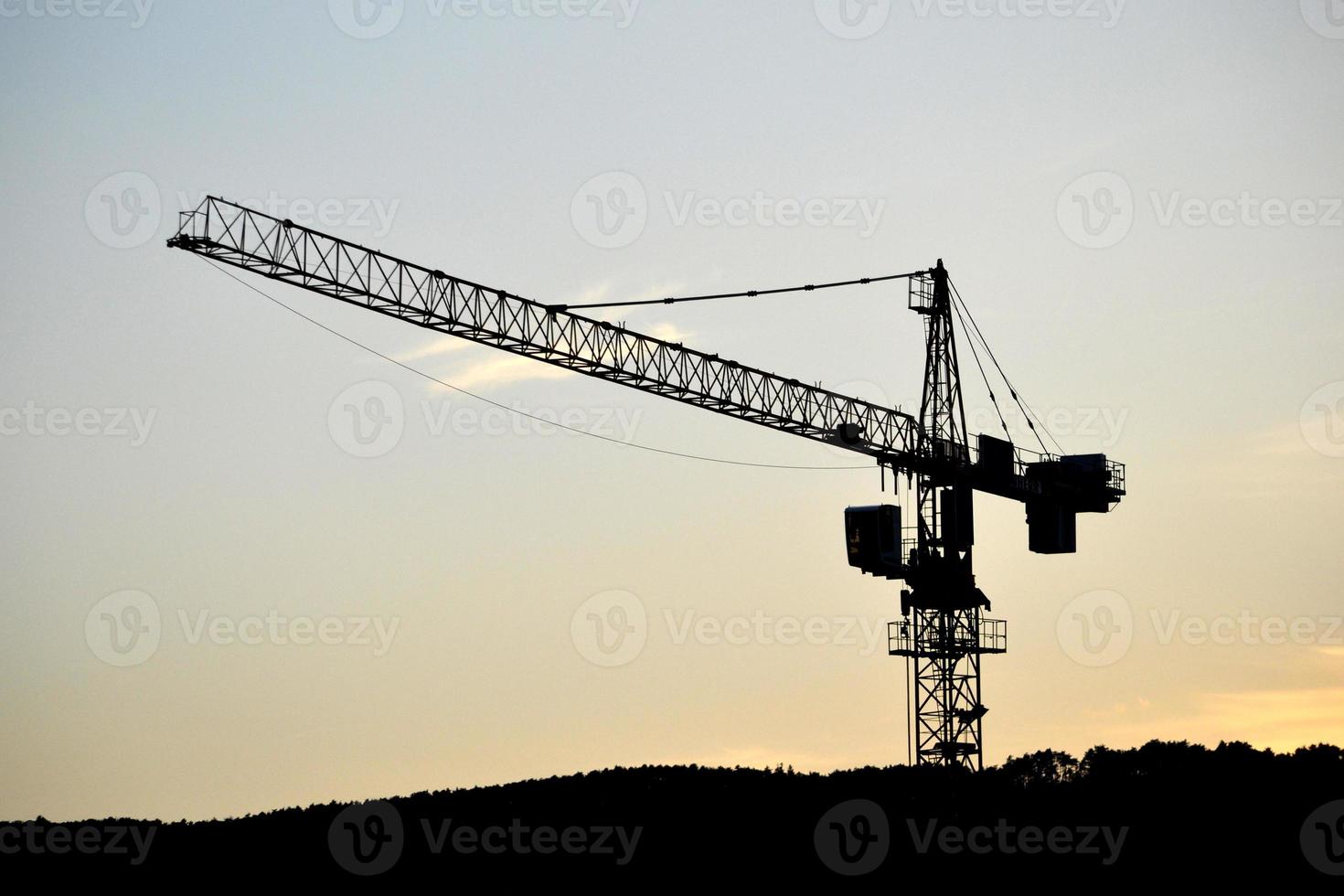 Construction Crane and Sunset Sky in Background photo
