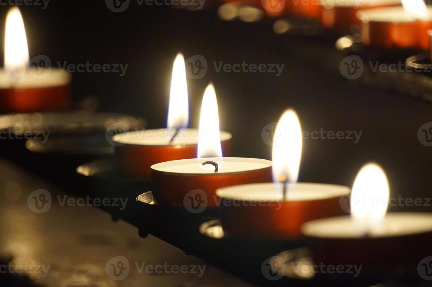 Burning Small Candles - Selective Focus - Religion Concept photo