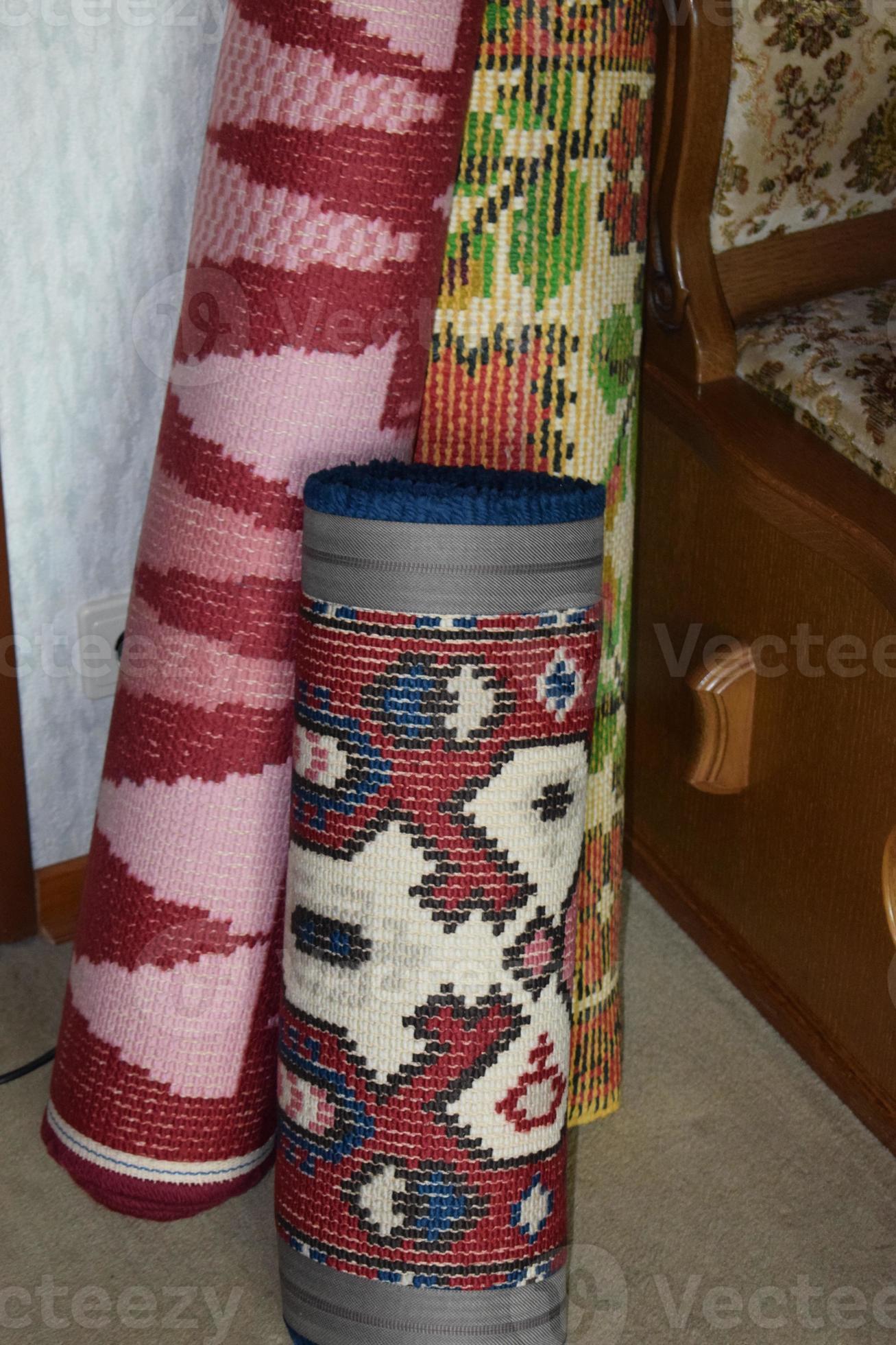 Rolled up Carpets 23131484 Stock Photo at Vecteezy