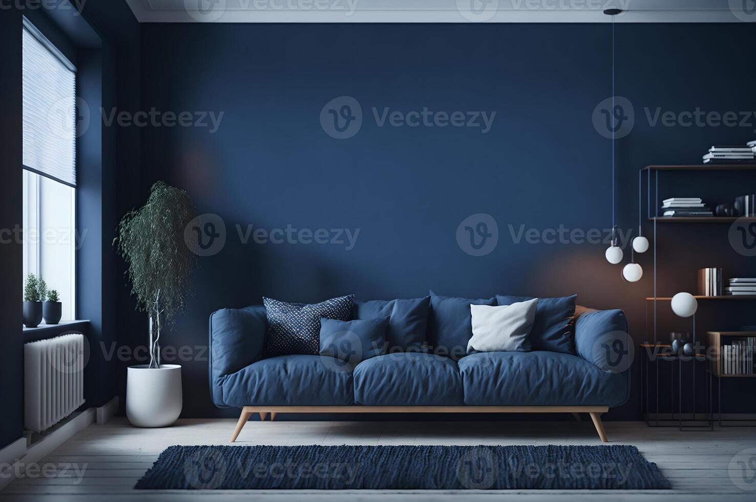 modern living room interior with blue sofa, pillows, and lamp on a dark blue wall photo