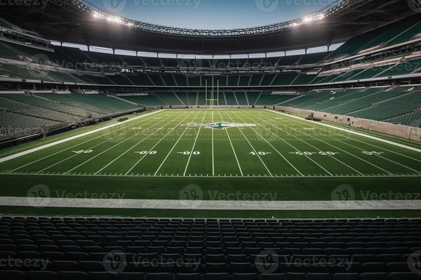 Green field game ready at midfield in an American football stadium. photo