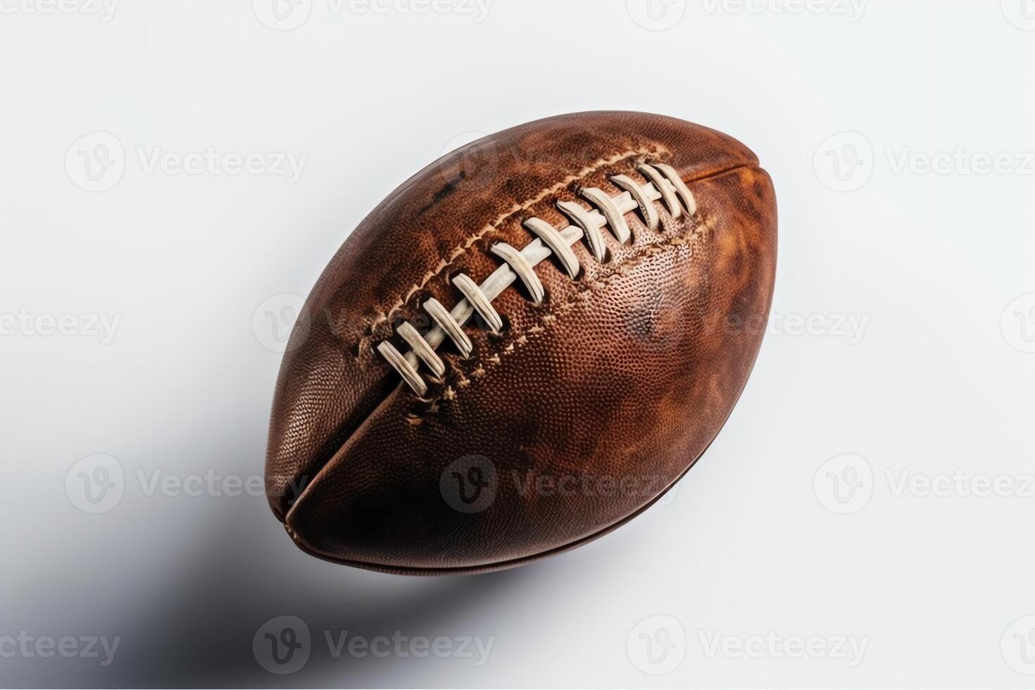 Top view shot of American football on white background. photo