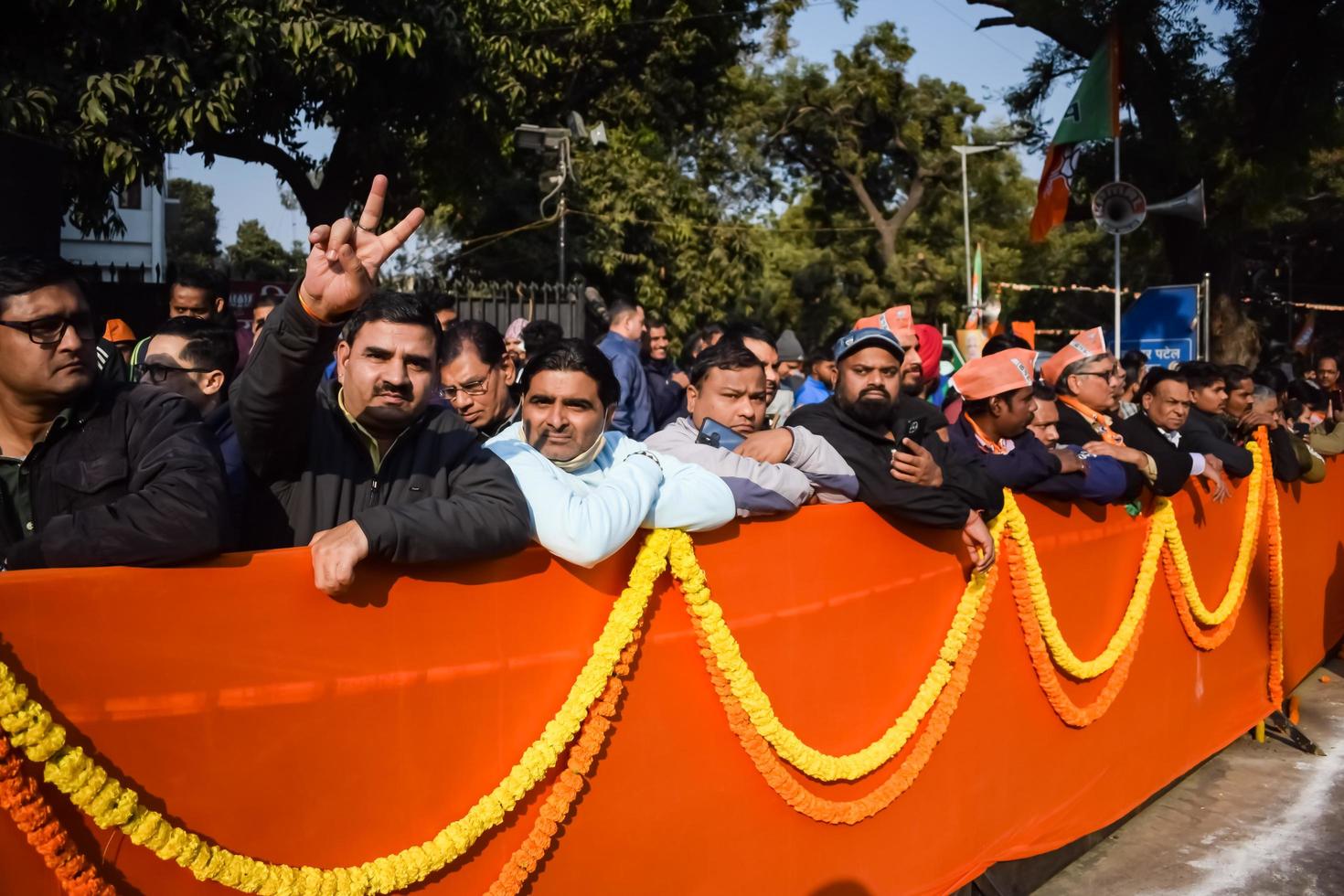 New Delhi, India - January 16 2023 - Thousands of people collected during Prime Minister Narendra Modi BJP road show, people during PM Modi big election rally in the capital photo