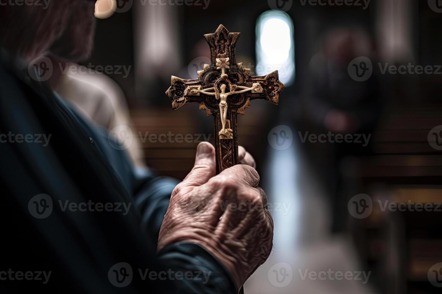 Church priest holds religious cross in hands. photo