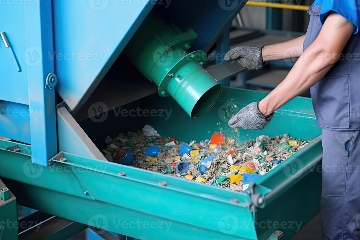 Conveyor belt with pile of waste at recycling plant. photo