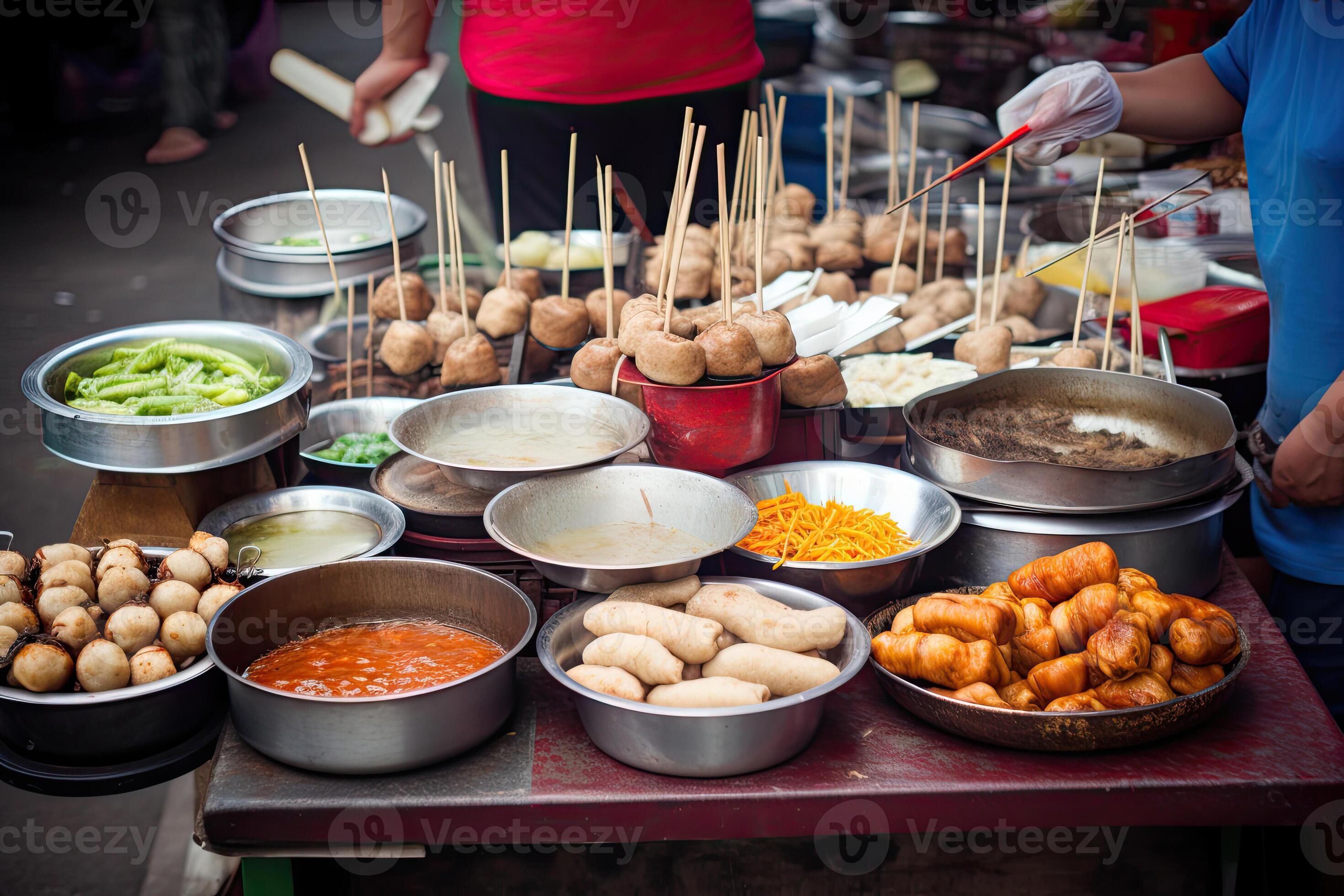 Asian street food. Traditional oriental dishes at street market