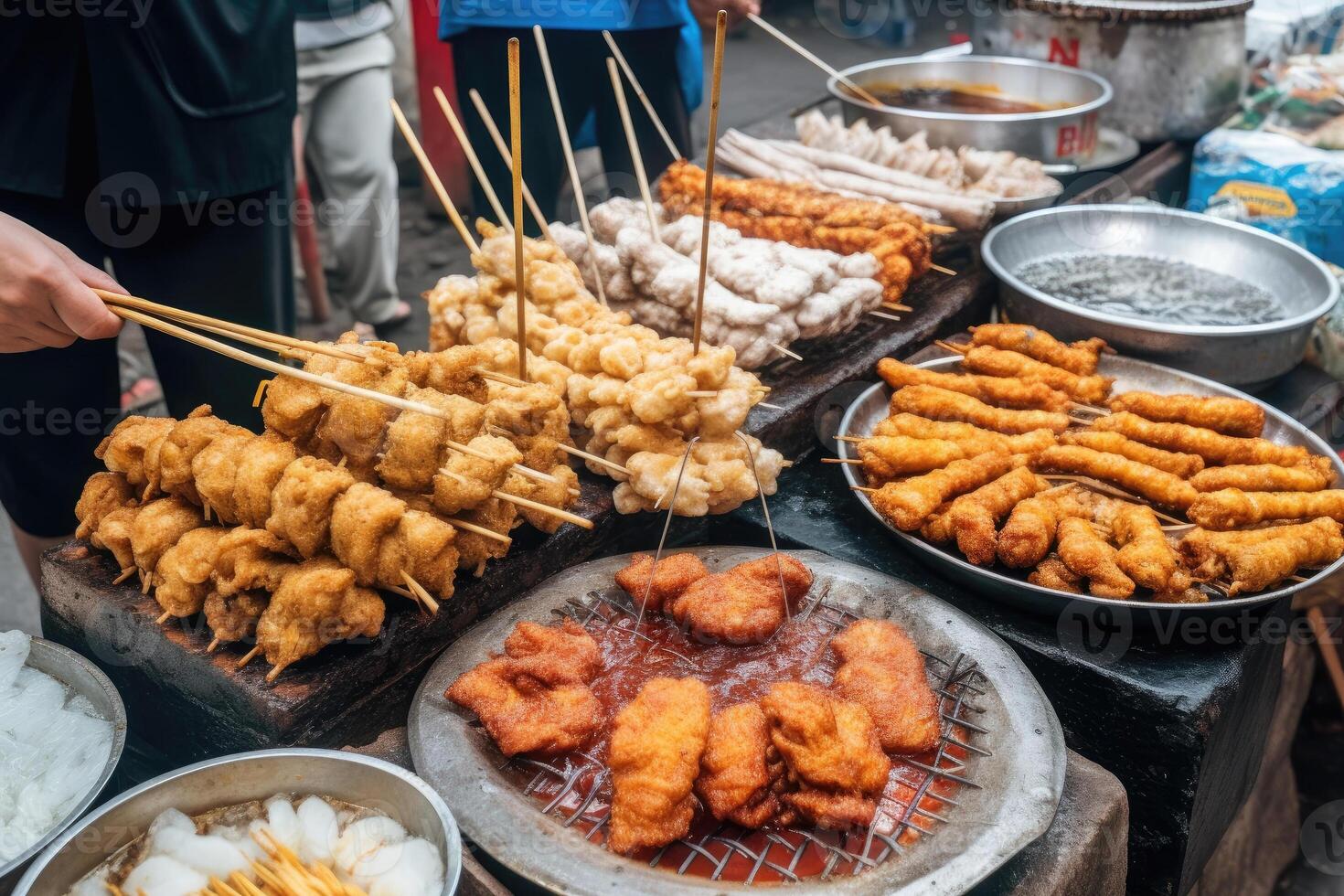 Asian street food. Traditional oriental dishes at street market. photo