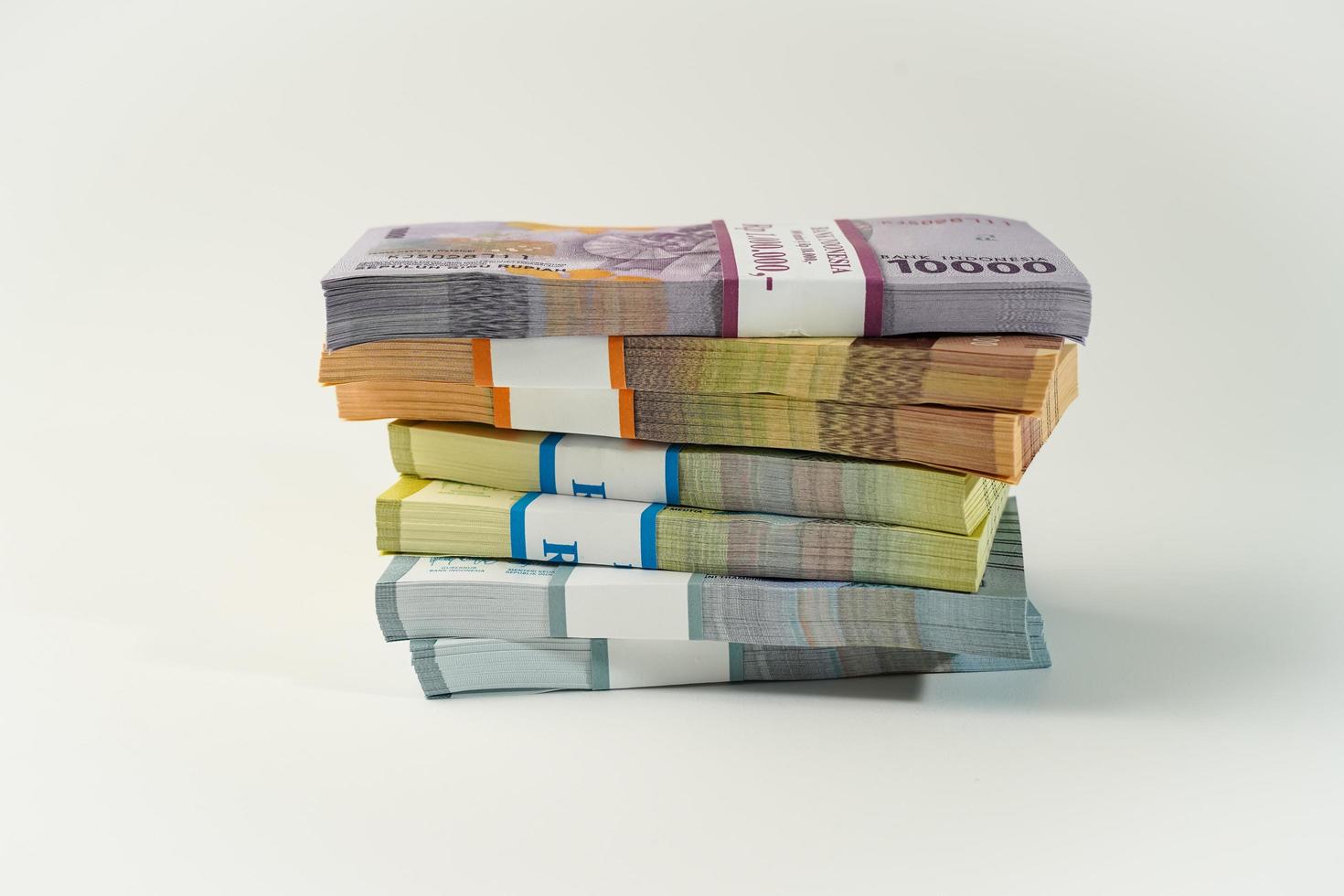 Jakarta, Indonesia, April 15, 2023, various bundles of Indonesian rupiah banknotes in the IDR currency thousands copy space thr zakat photo