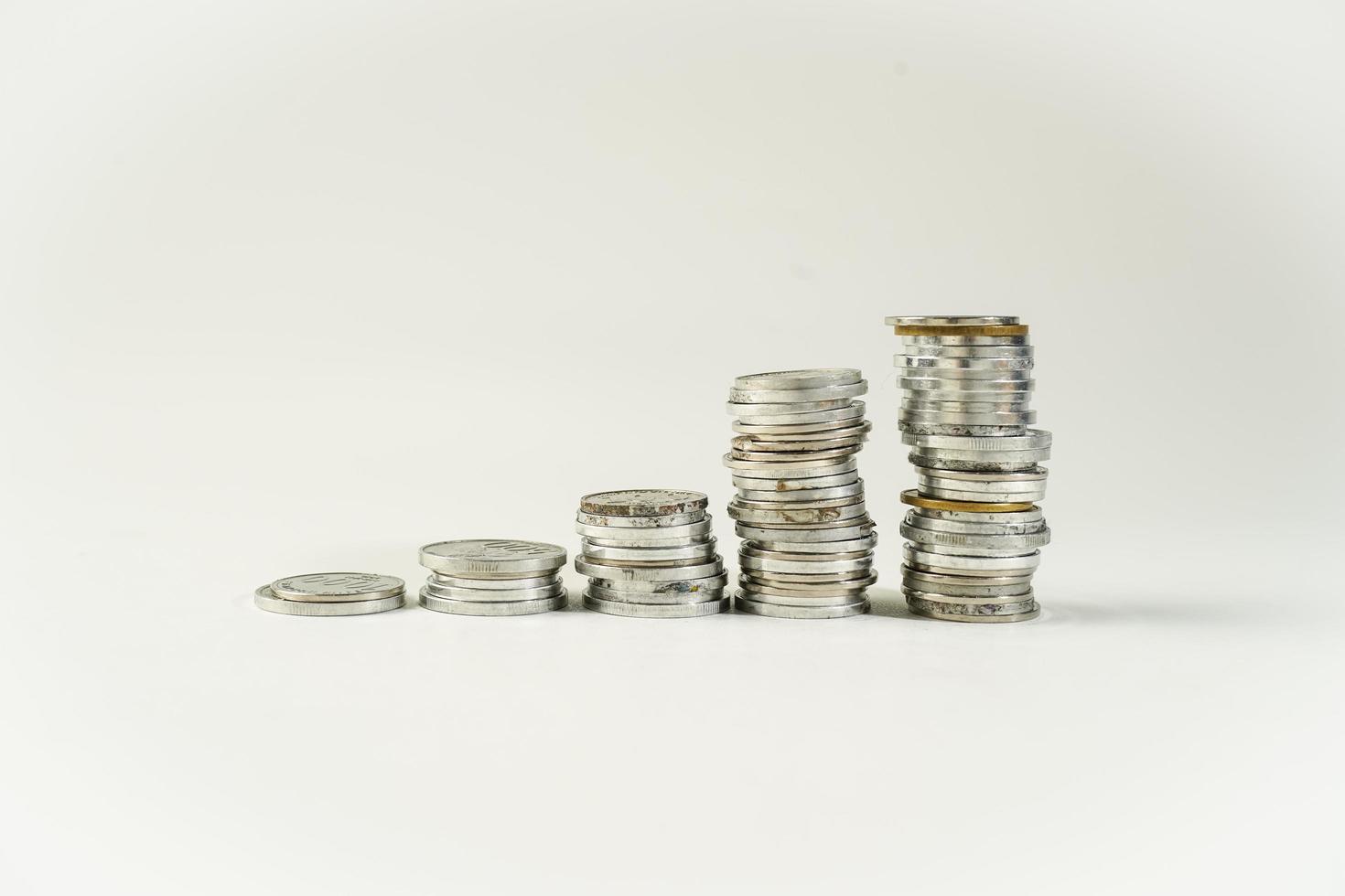 Jakarta, Indonesia, April 15, 2023, money saving graph with coins and banknotes, Background for business idea and design, Chart for financial investment concept, rupiah, thr zakat. photo