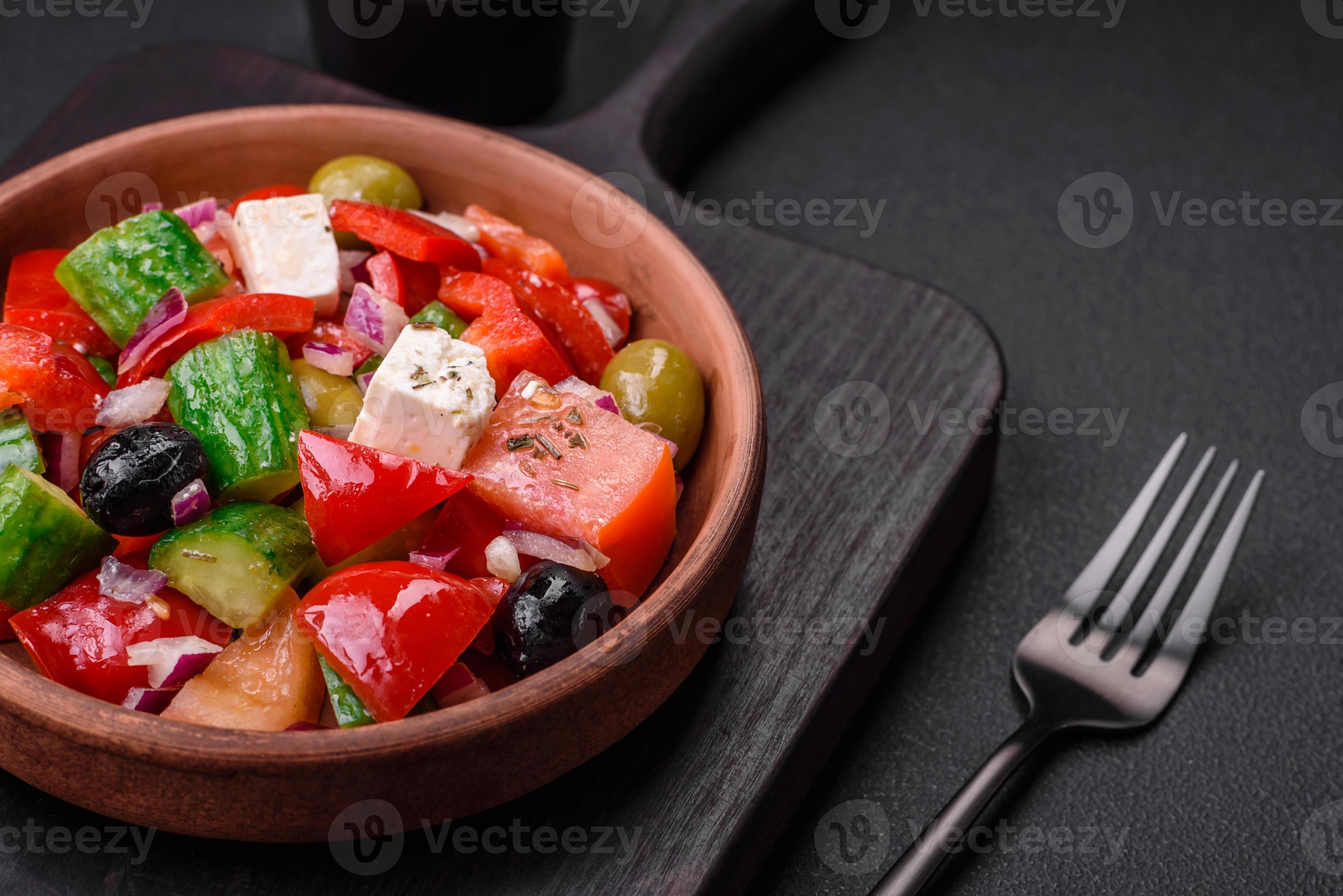Delicious, fresh Greek salad with feta cheese, olives, tomatoes and