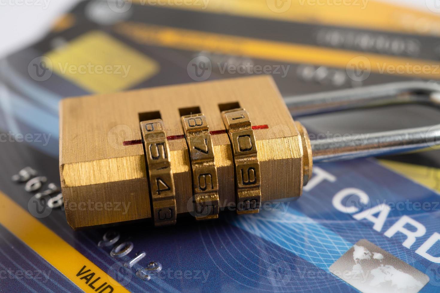 Credit card with password key lock, finance security concept. photo