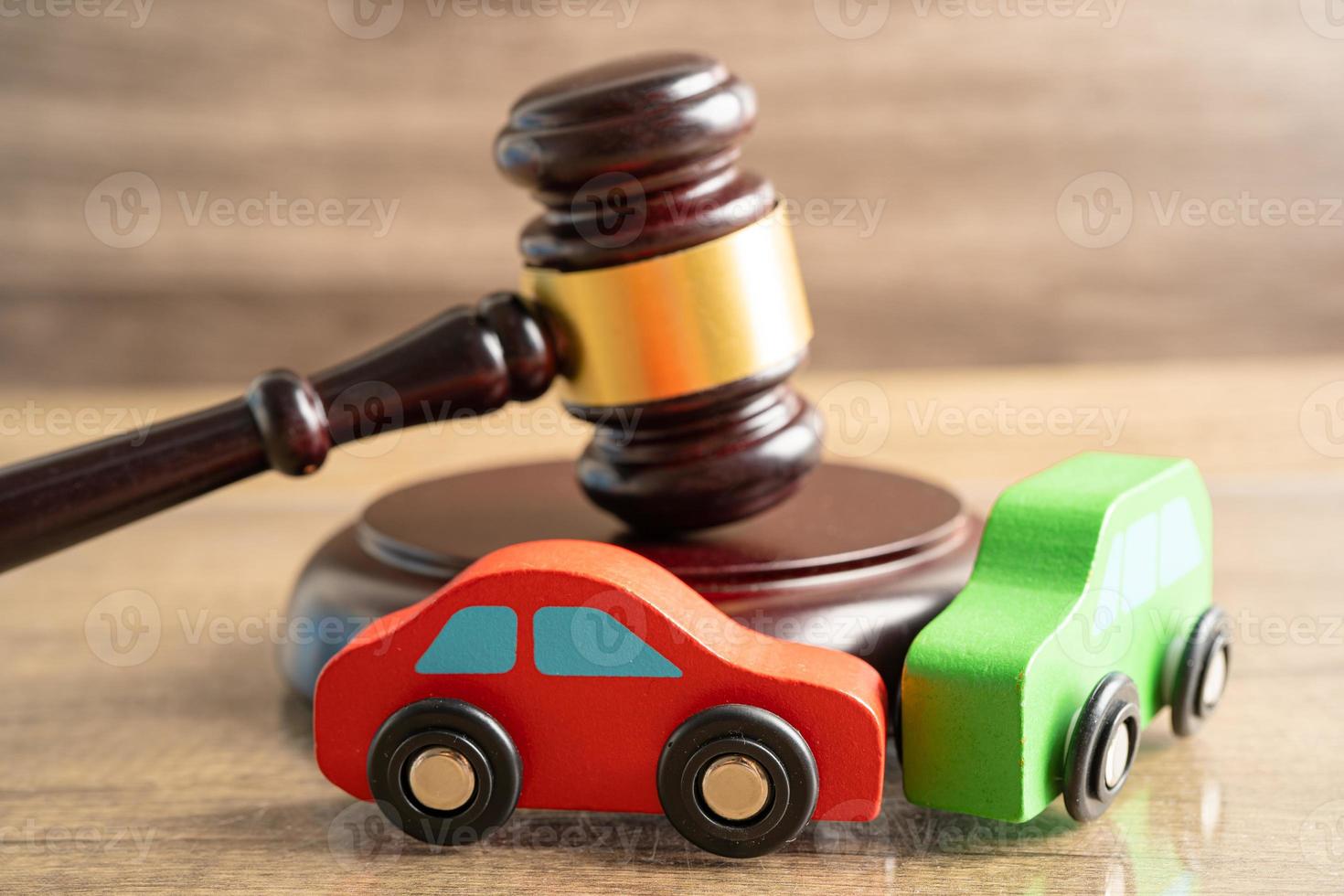 Hammer gavel judge with car vehicle accident, insurance coverage claim lawsuit court case. photo