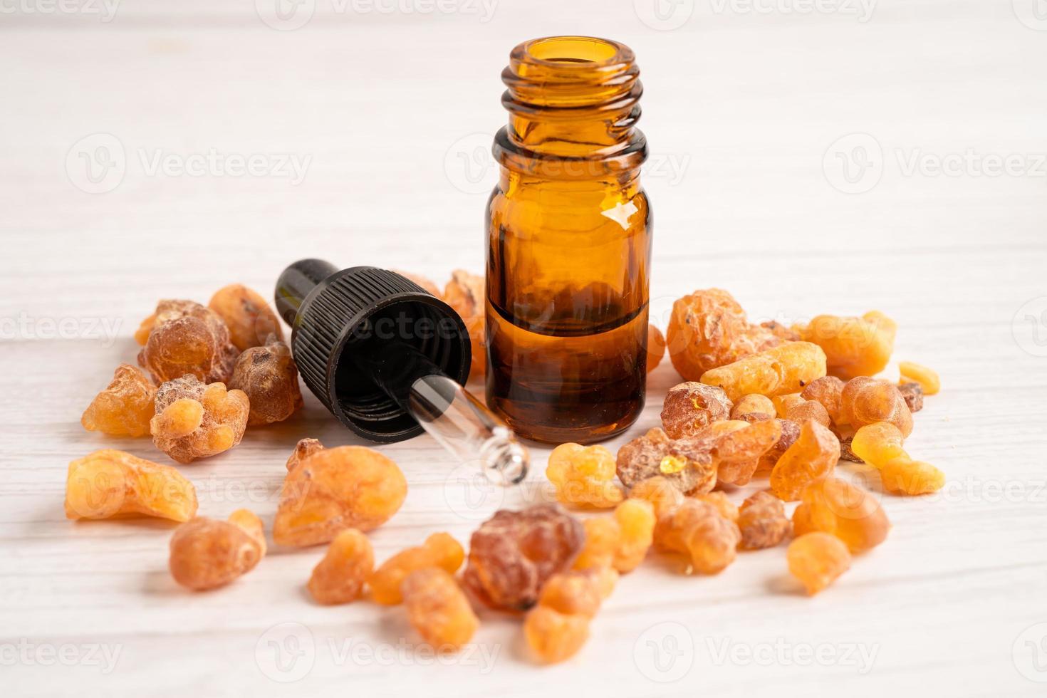 Frankincense or olibanum aromatic resin isolated on white background used in incense and perfumes. photo