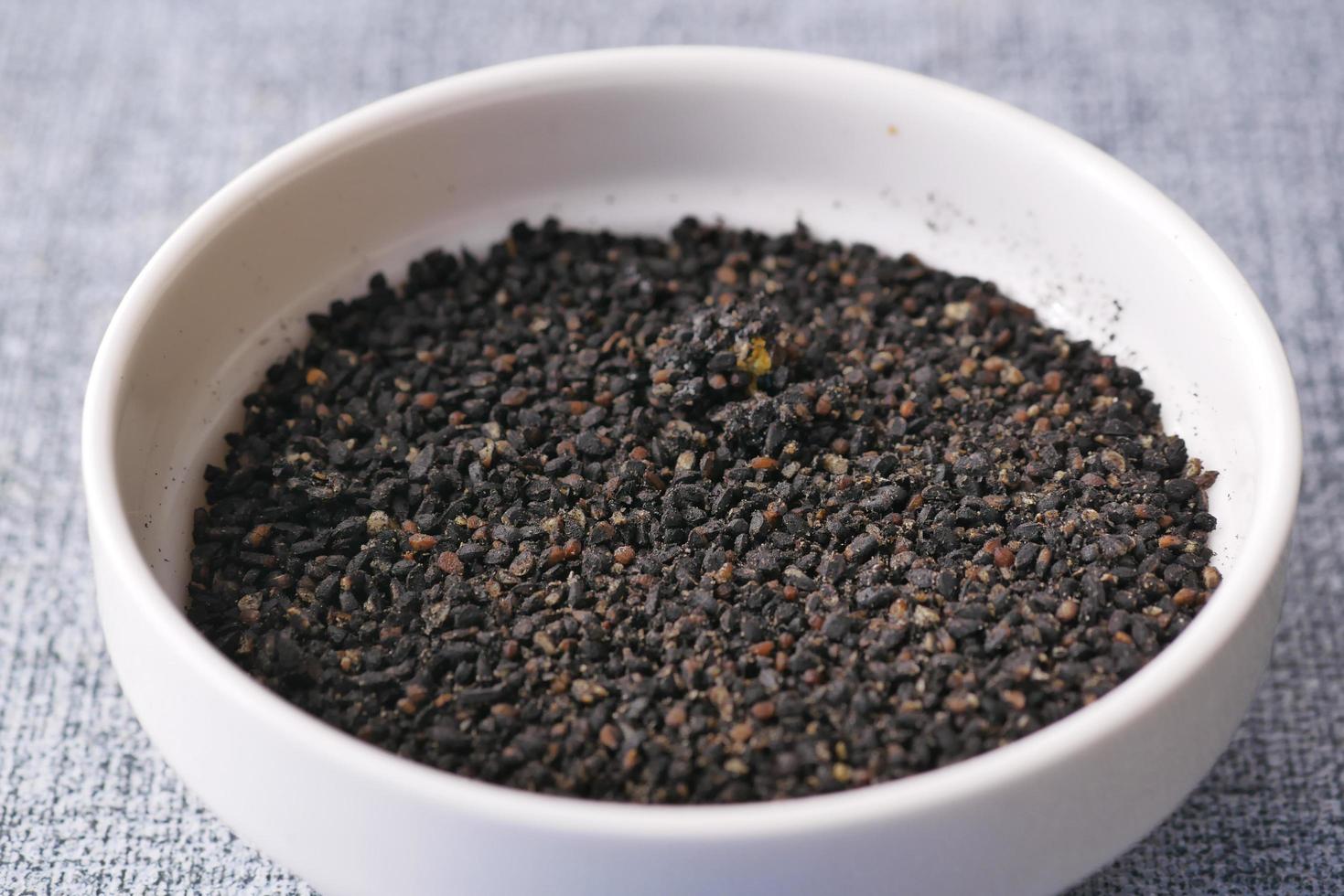 Black Cumin seed in a bowl on table photo