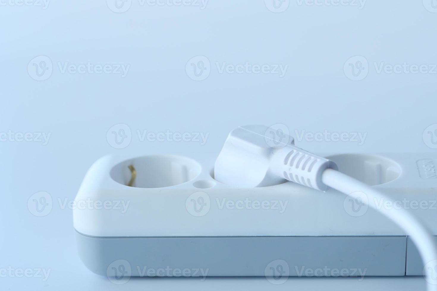 Electrical switch and plug on white background, photo