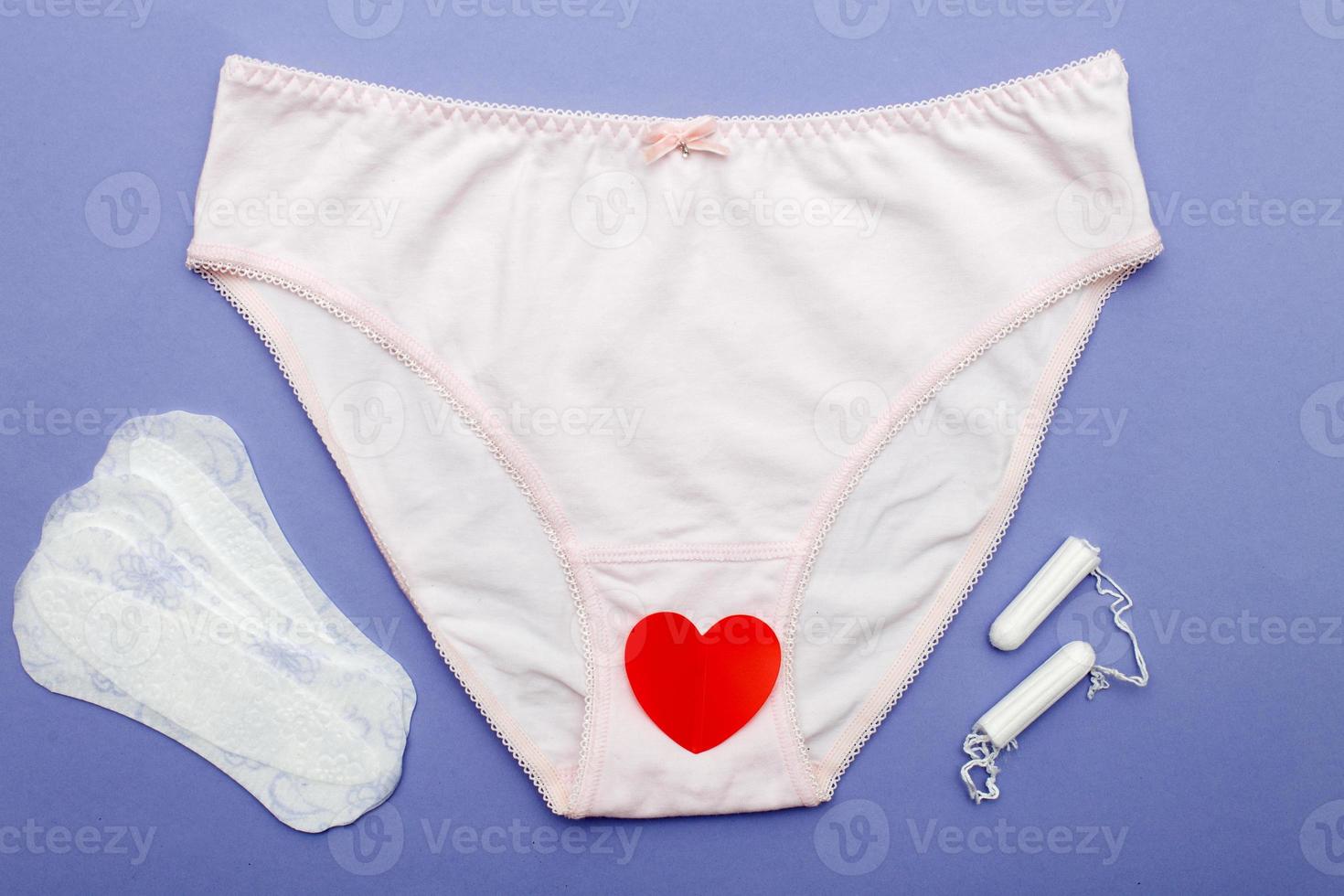 women's briefs with tampons and panty liners . hygiene and women's health care concept photo