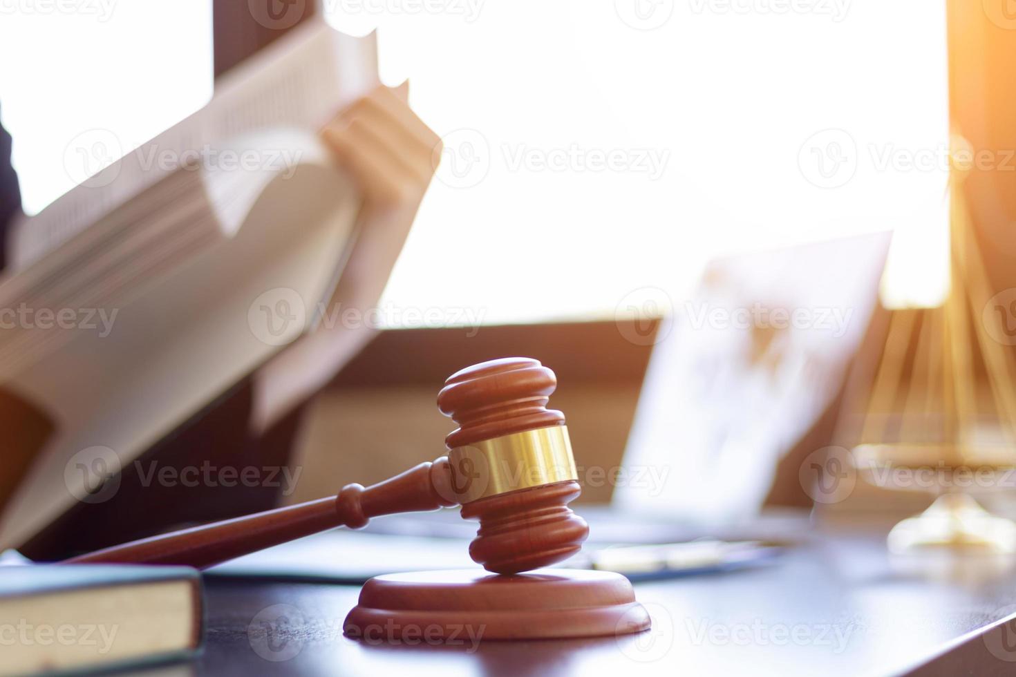 wooden judge gavel on table as symbol of justice for use in legal cases judicial system and civil rights and social justice concept with judge. concept of legislation to judge lawsuits with justice. photo