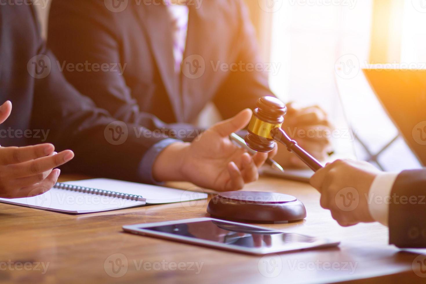 wooden judge gavel on table as symbol of justice for use in legal cases judicial system and civil rights and social justice concept with judge. concept of legislation to judge lawsuits with justice. photo