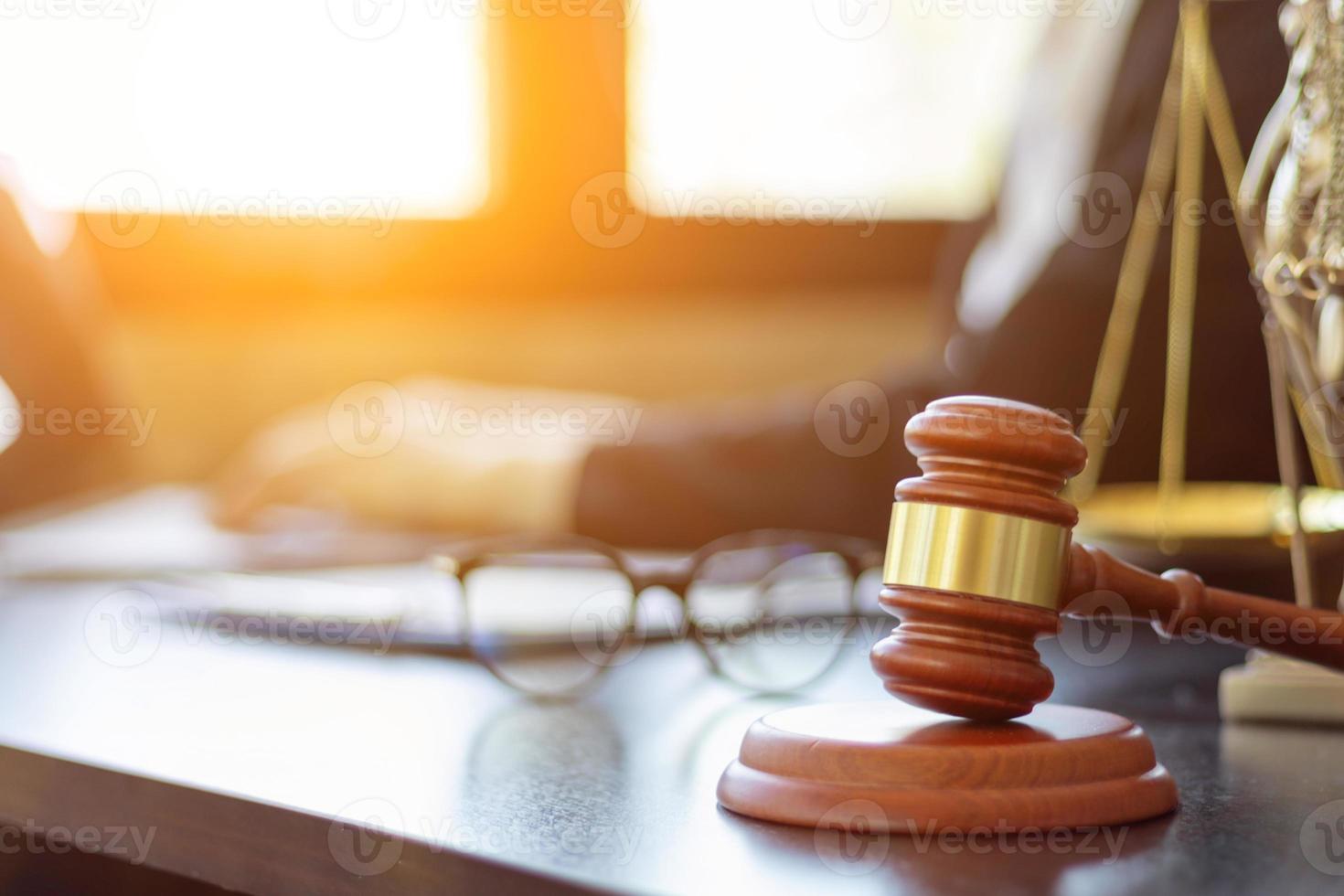 wooden judge gavel on table as symbol of justice for use in legal cases judicial system and civil rights and social justice concept with judge. concept of legislation to judge lawsuits with justice. photo