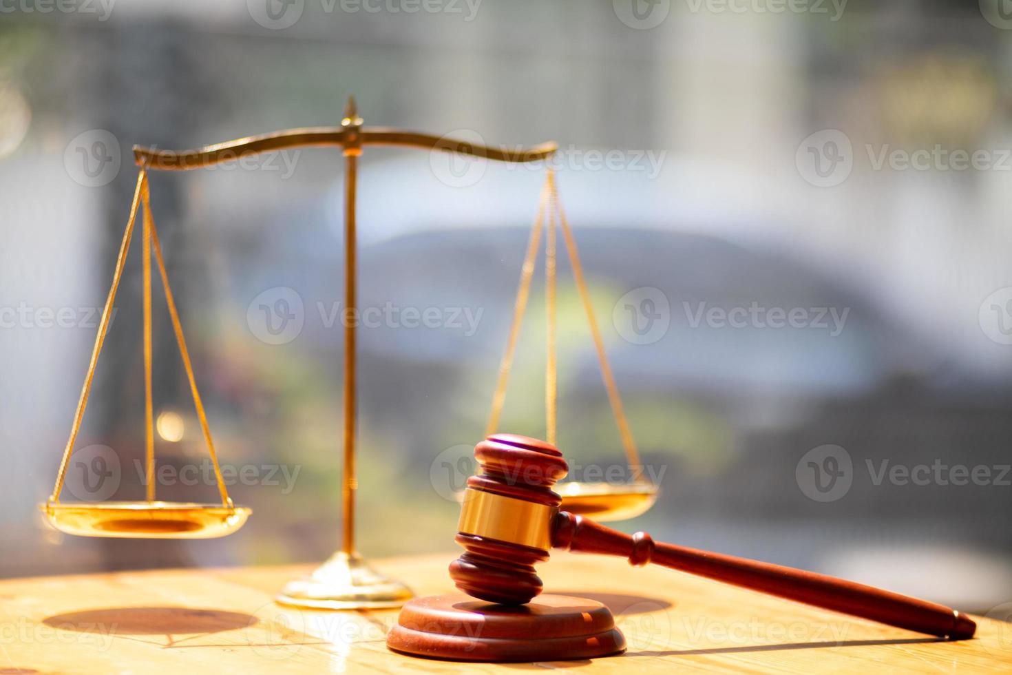 wooden judge gavel on table as symbol of justice for use in legal cases judicial system and civil rights and social justice concept with judge. concept of legislation to judge lawsuits with justice. photo