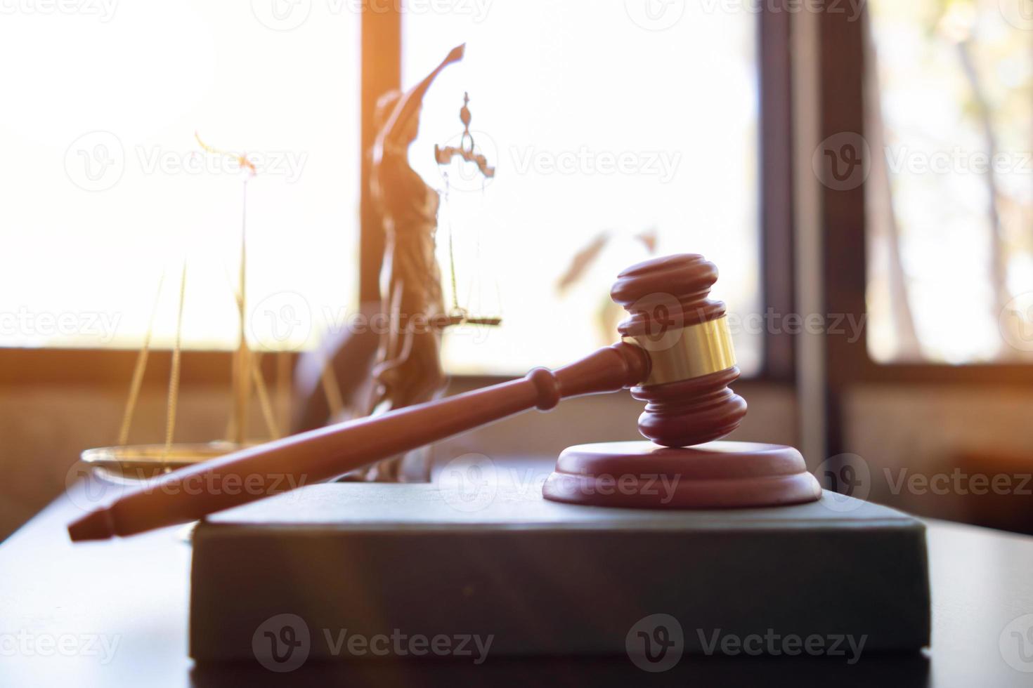 wooden judge gavel on table as symbol of justice for use in legal cases judicial system and civil rights and social justice concept with judge. concept of legislation to judge lawsuits with justice. photo